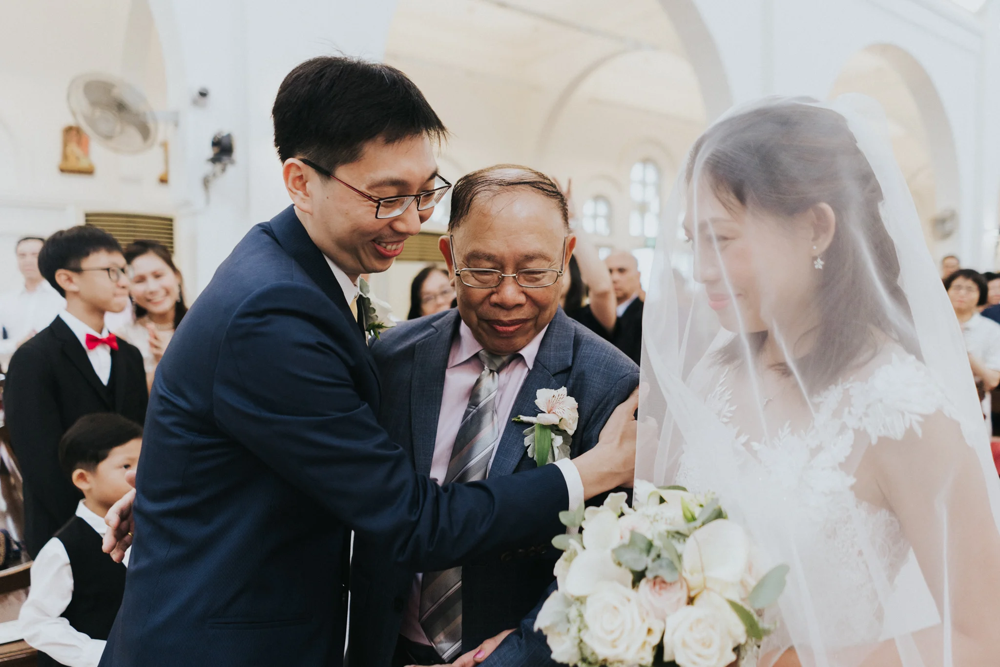 SingaporeWeddingPhotographer_FourSeasonsHotel_ChurchofStTeresa-30.jpg