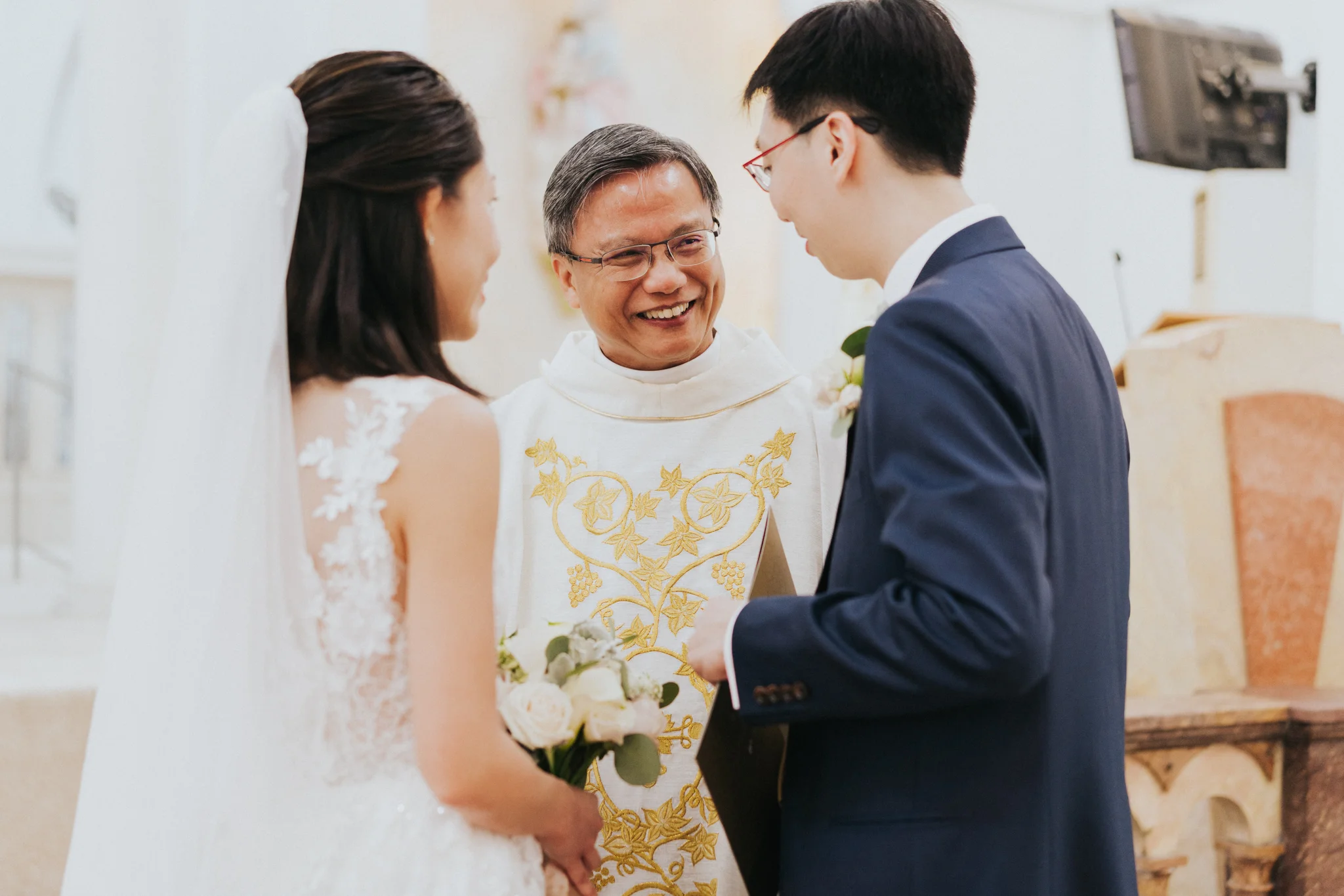 SingaporeWeddingPhotographer_FourSeasonsHotel_ChurchofStTeresa-57.jpg