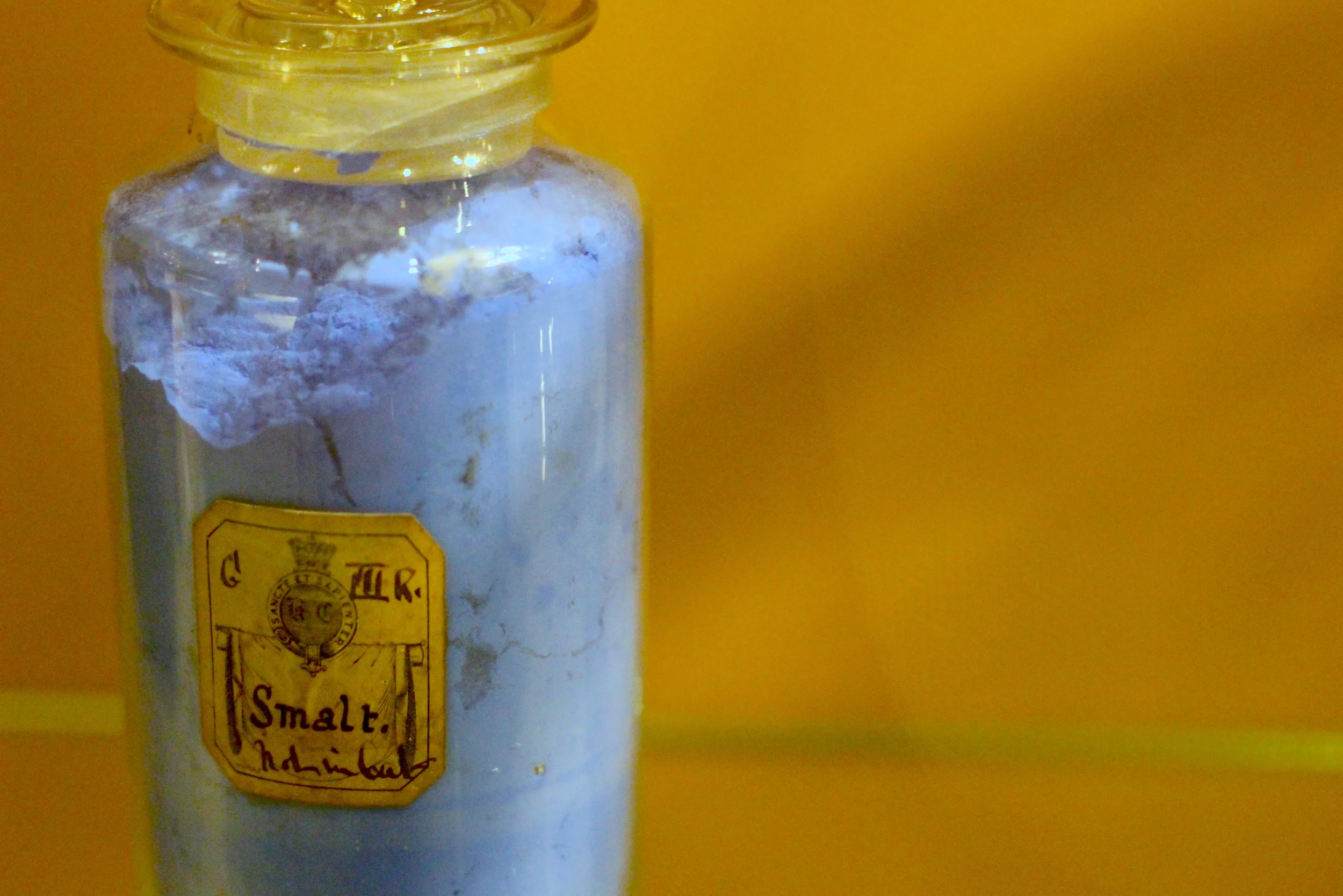 Curious cerulean powder. Hand writing scribbled & long-form gone from modern children. Curious cerulean powder. Bottled & preserved two-fold. Sealed behind glass, behind glass. Rich alchemy.