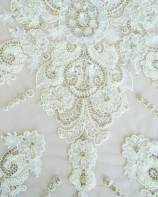 Spending the weekend putting the final touches on our e-boutique! How gorgeous is this incredible hand embellishment!? #embellishment #sydneydressmaker #melbournedressmaker #fashiondesign #lace #bridallace #fabricstore