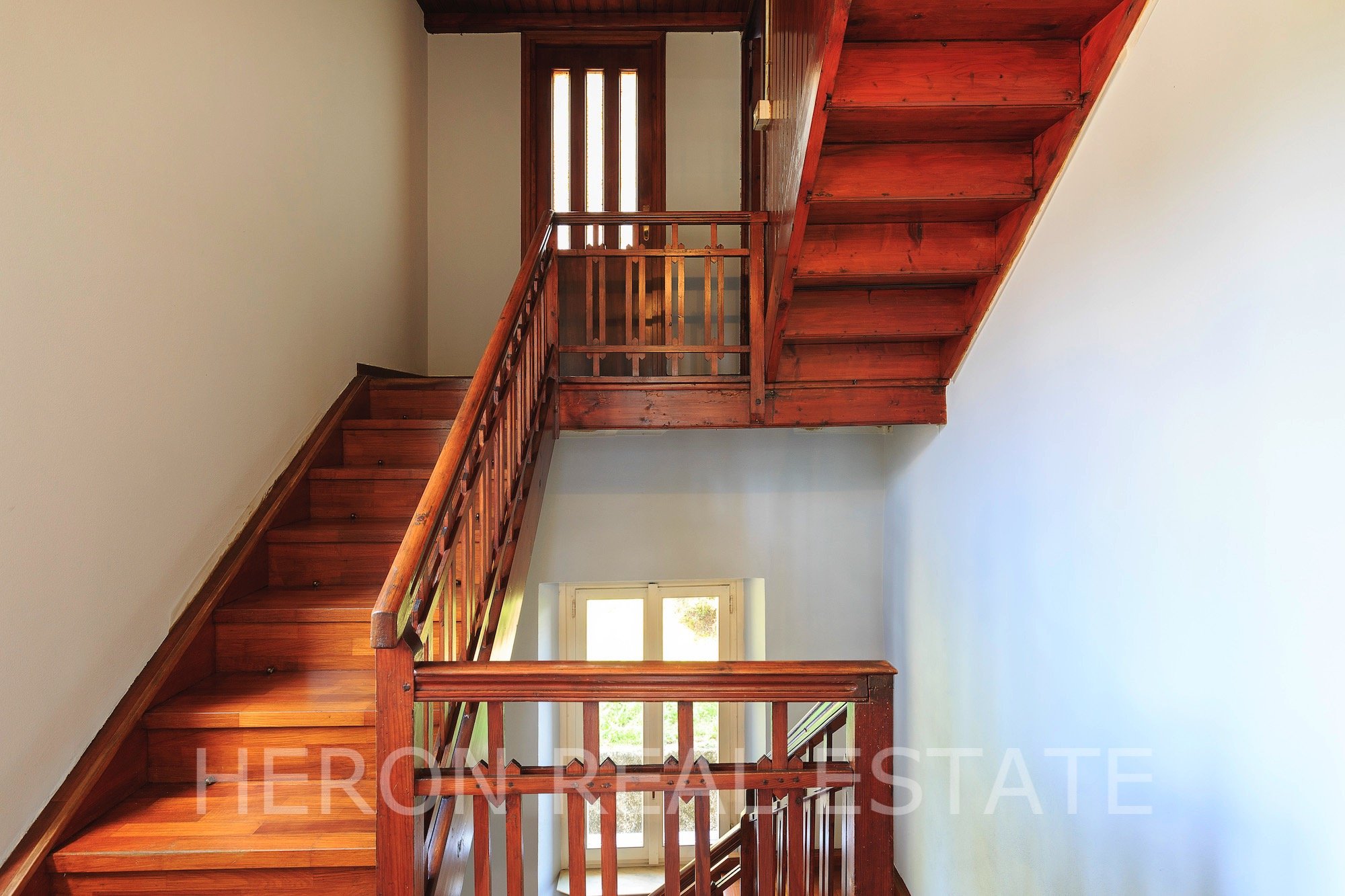 villa oleandra wooden staircase.jpg
