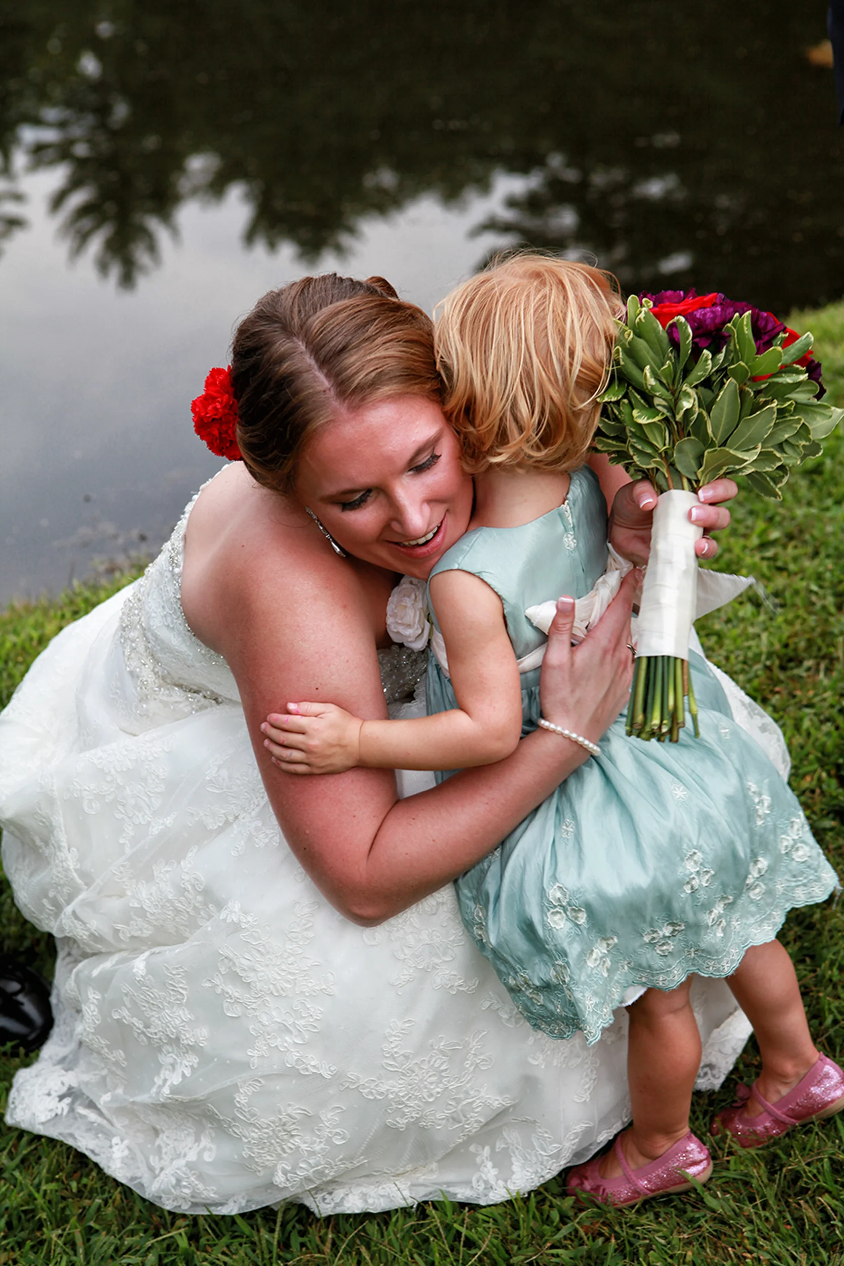 Bride hugging niece in Kingston