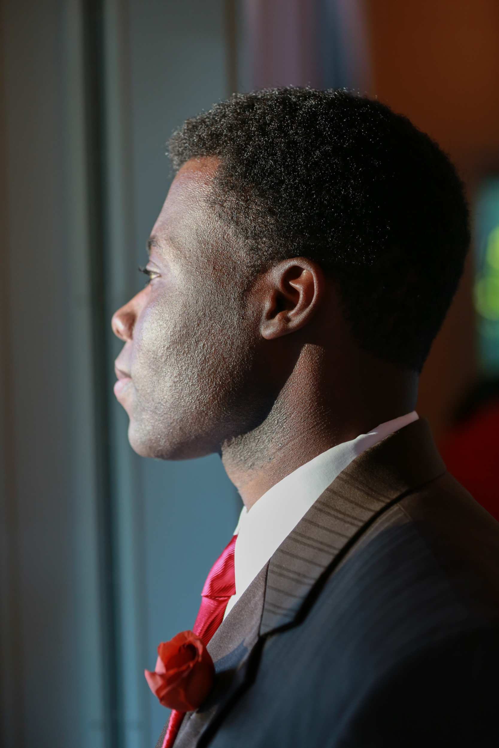 Groom photographed waiting for the bride