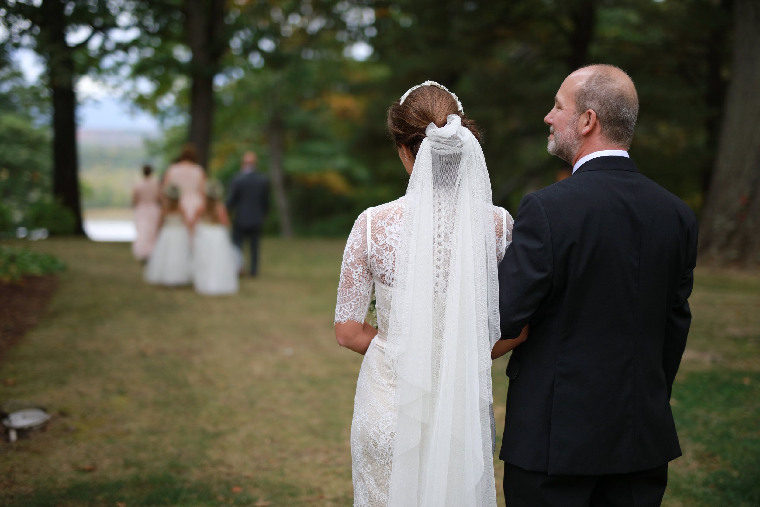 Livingston Manor Photo of a father and daughter right before walking down the aisle. 