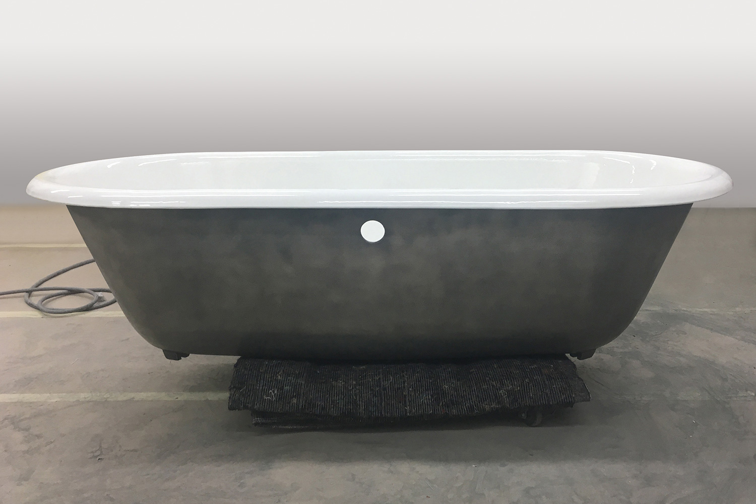 Liqui-Met Liquid Metal Coated Bathtub In Workshop.jpg