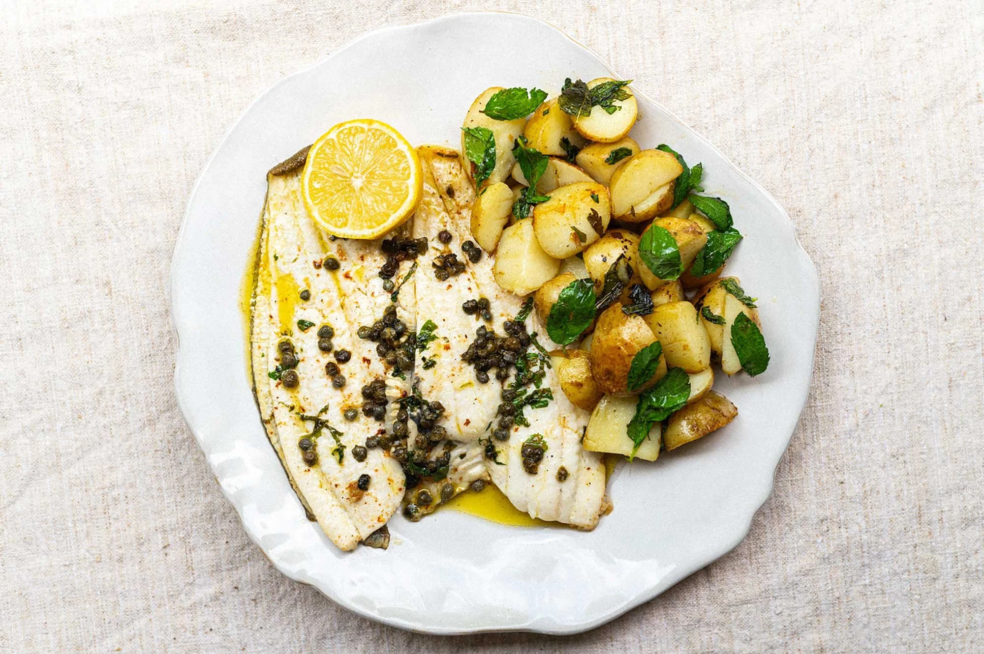 Looking for a super simple delicious fish recipe this Friday?

Try out this recipe with our delicious plaice fillets.

Ingredients

2 fresh plaice fillets

2 tbsp butter

1 tbsp olive oil

1 lemon (half for juice, half for wedges)

1 tbsp capers (opt