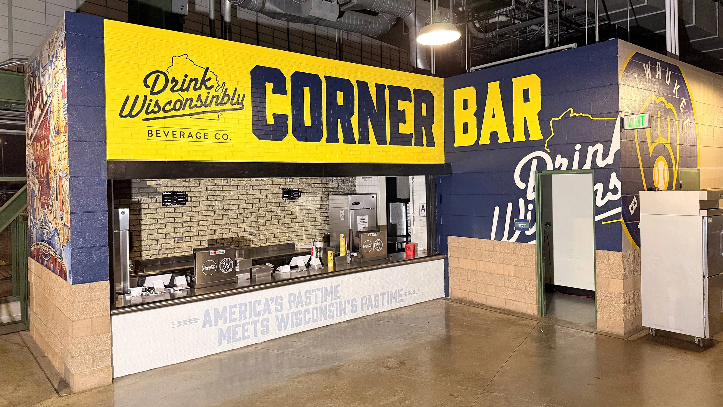 Drink Wisconsinbly Corner Bar mural behind section 103 in the outfield at American Family Field Milwaukee Brewers stadium, painted by Green Bay artist Zane Statz