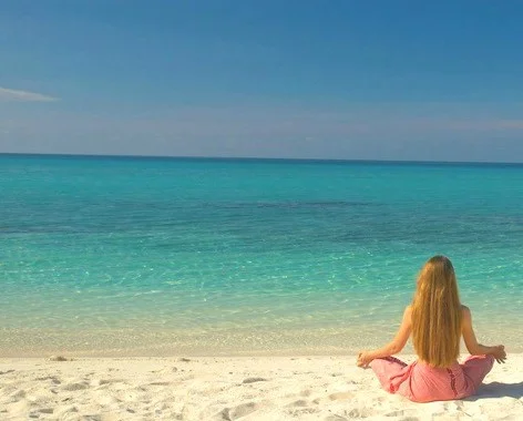 woman_meditating_beach_cropped.jpg