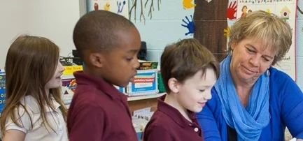 With smaller class sizes, teachers at St. Timothy K-8 Catholic School are able to provide lots of one-on-one attention and caring support.