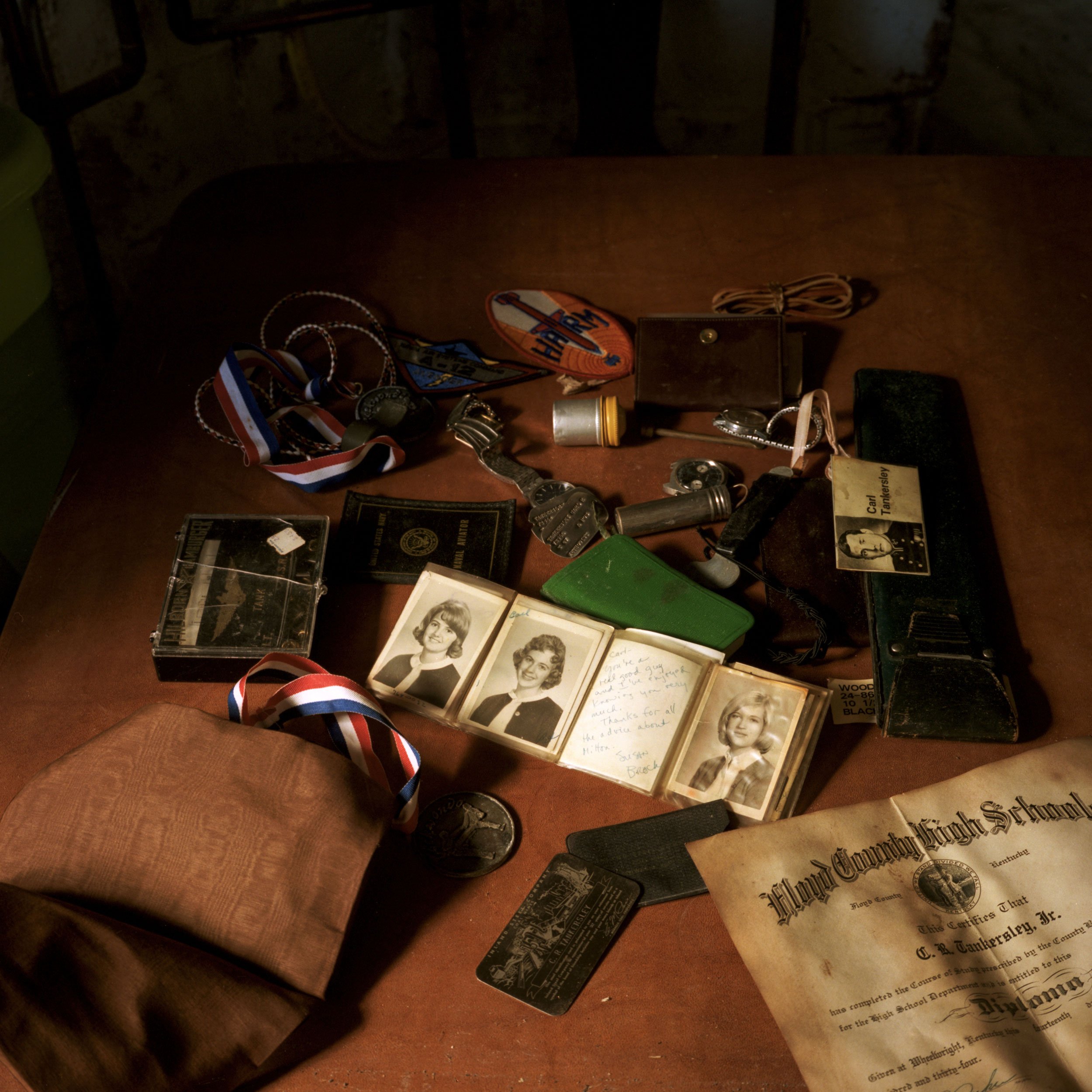 Dad's keepsakes drying after a basement flood, Easton