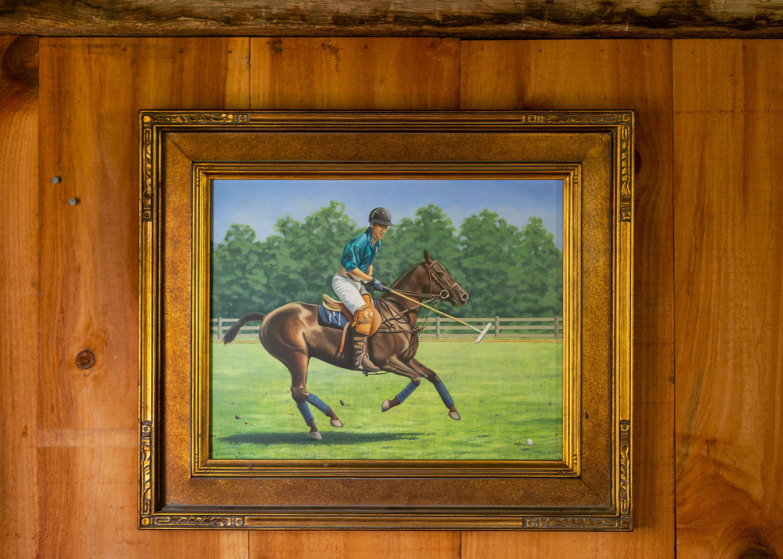A painting by Jon shaw of a friend on one of his polo ponies at Mashomac Polo Club, New York