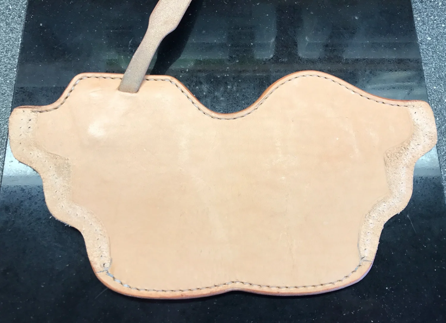 Edges Beveled, Burnished and Stitching Wet Pressed Into Leather