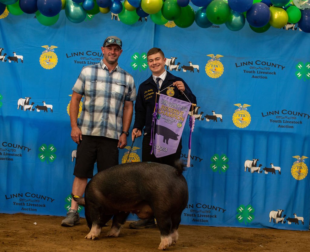  Dallas Headley, Reserve Grand Champion Hog, purchased by Raschein Tangent 