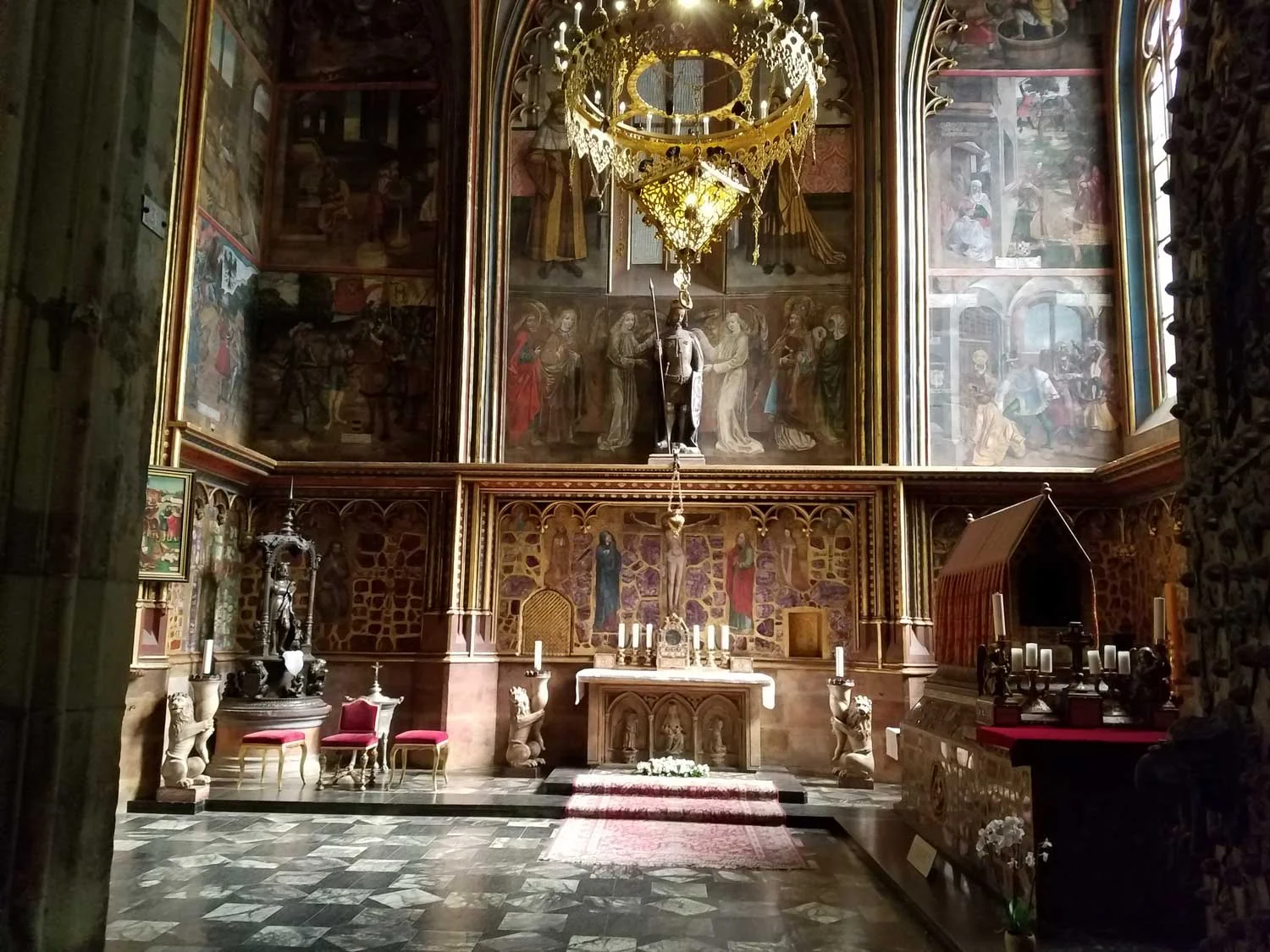 Remember that Christmas carol, Good King Wenceslas? It's about St. Wenceslas, one of the most important figures in Czech history. He was killed by his brother in 929 in a power struggle, and later made into a saint. This room in the St. Vitus cathedral is his tomb. In another even older church next door, you can find the tomb of his grandmother, who strangled herself to death after her daughter-in-law (Wencelsas' mother) sent people to kill her some years earlier. They sound like a lovely family.