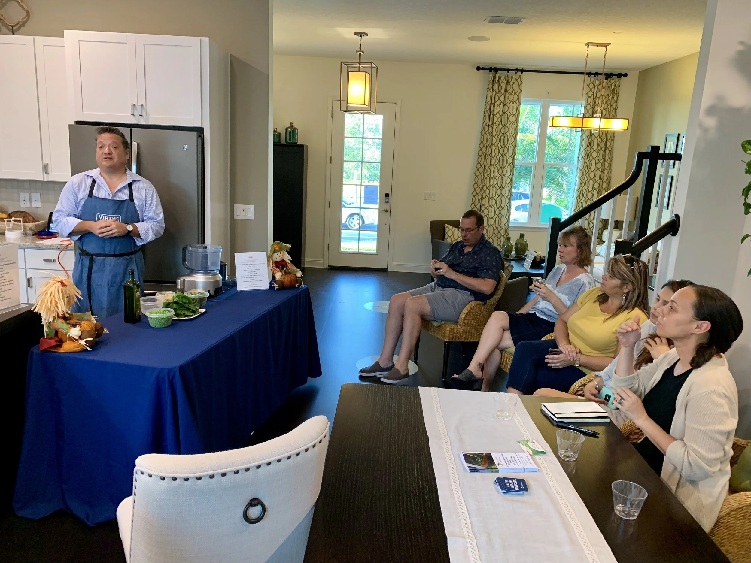 Chef Andy from Fueling Performance Athletes teaching how to prepare flavorful dishes with home-grown produce