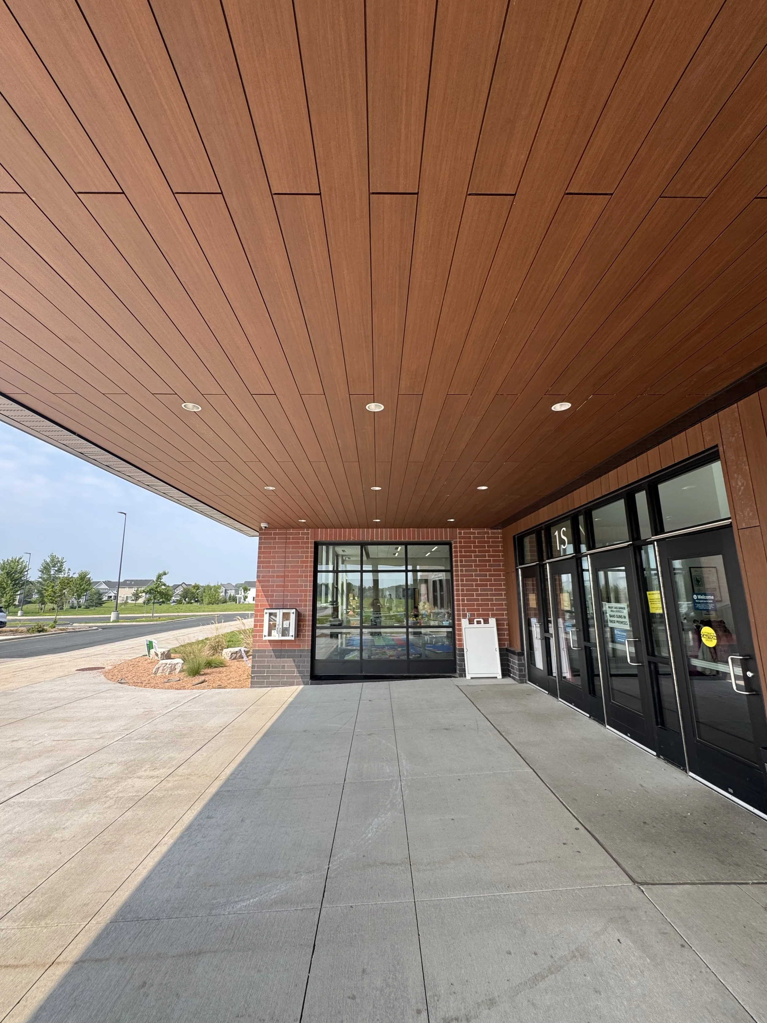 Wood grain phenolic composite and architectural single skin panels installed at Hamilton Ridge Elementary School in Savage, MN.