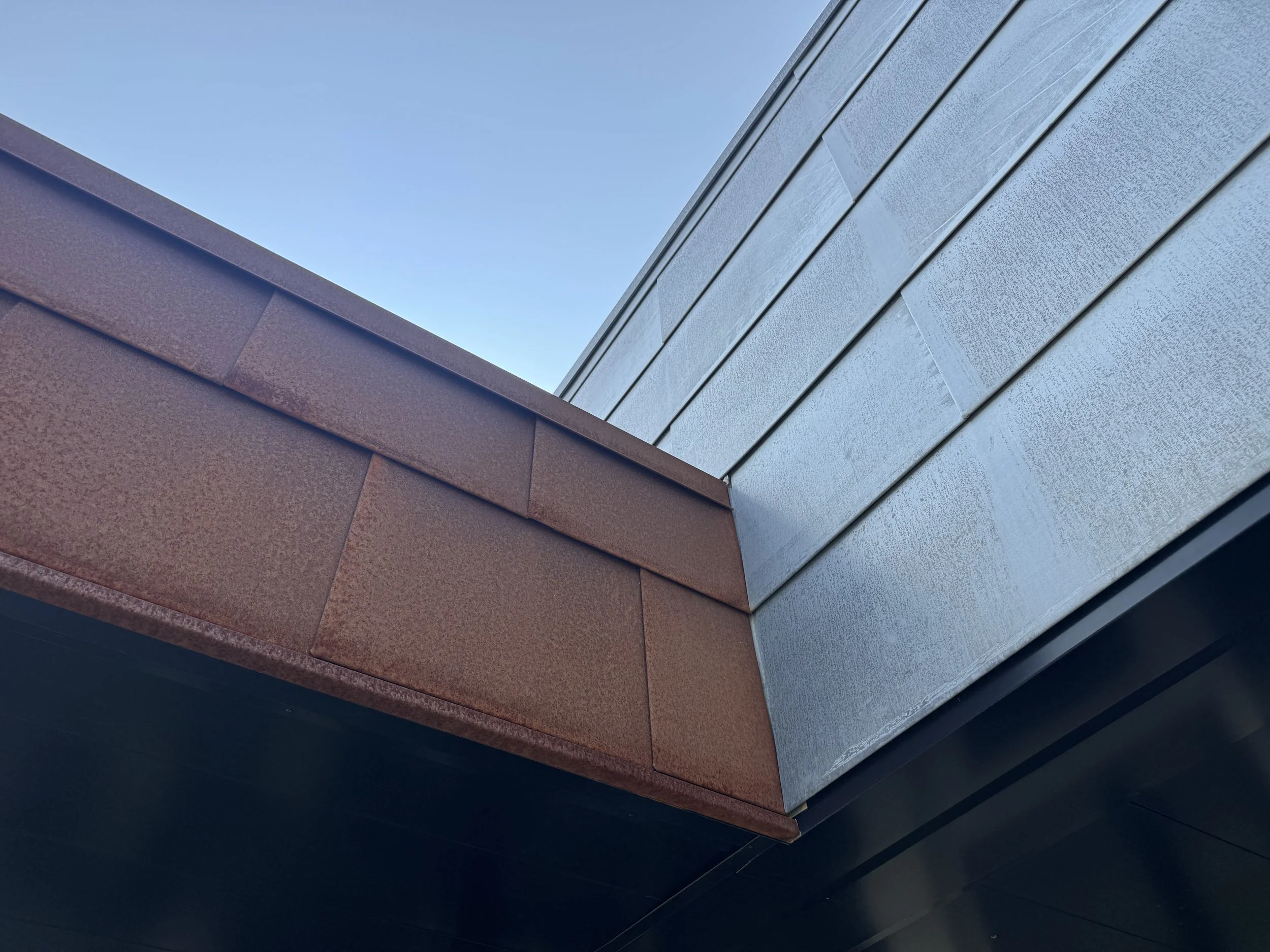 Zinc & Weathered Steel Flat Lock panels installed at the SW Transit Leonard L Simich Maintenance & Administrative Facility in Eden Prairie, MN.