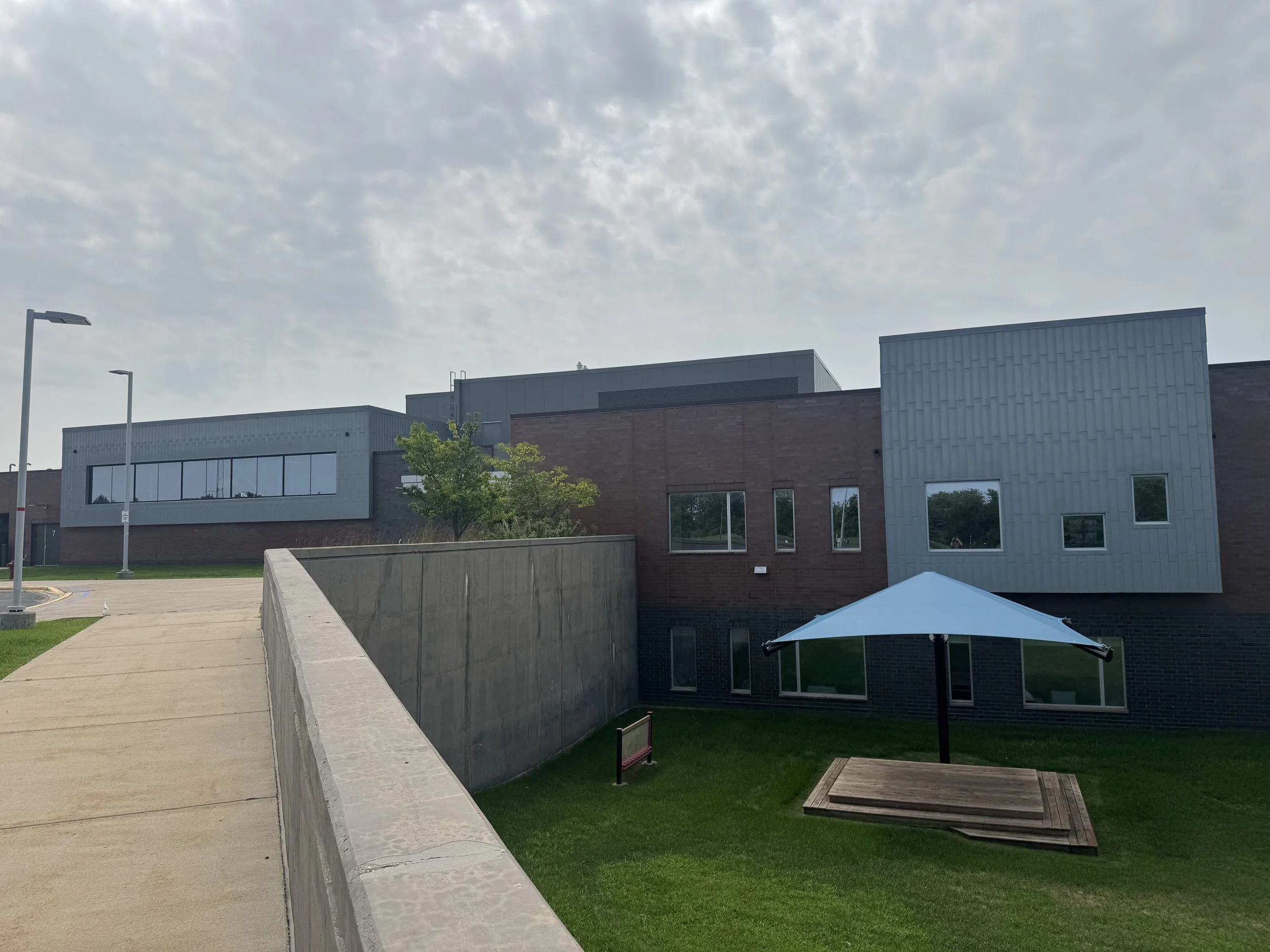 Zinc flat lock and aluminum composite panels installed at Dakota Valley Learning Center in Rosemount, MN.