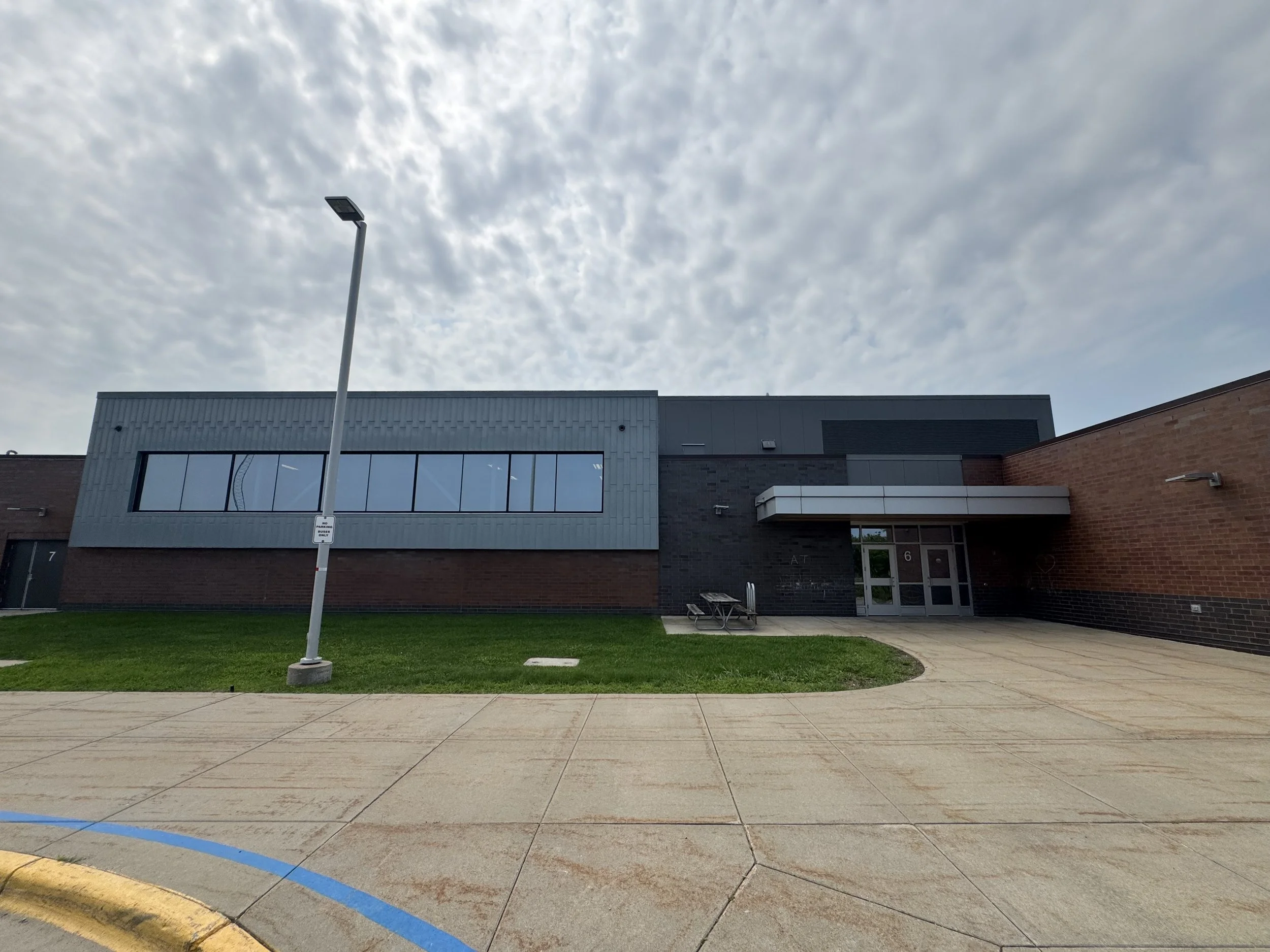 Zinc flat lock and aluminum composite panels installed at Dakota Valley Learning Center in Rosemount, MN.