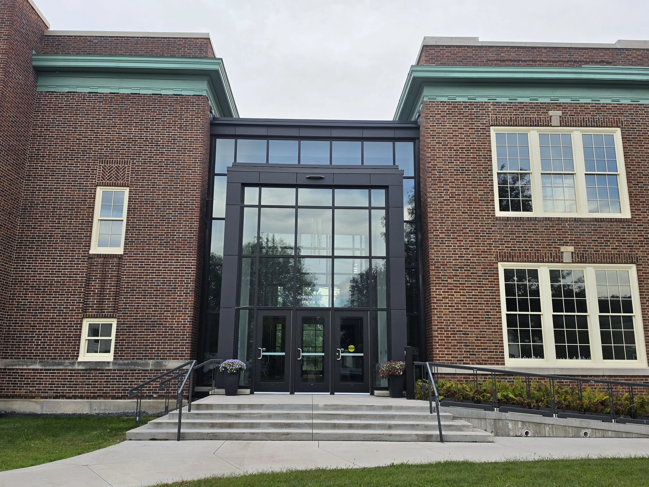 Phenolic Rainscreen Wall Panels installed at Chatfield Center for the Arts in Chatfield, MN.
