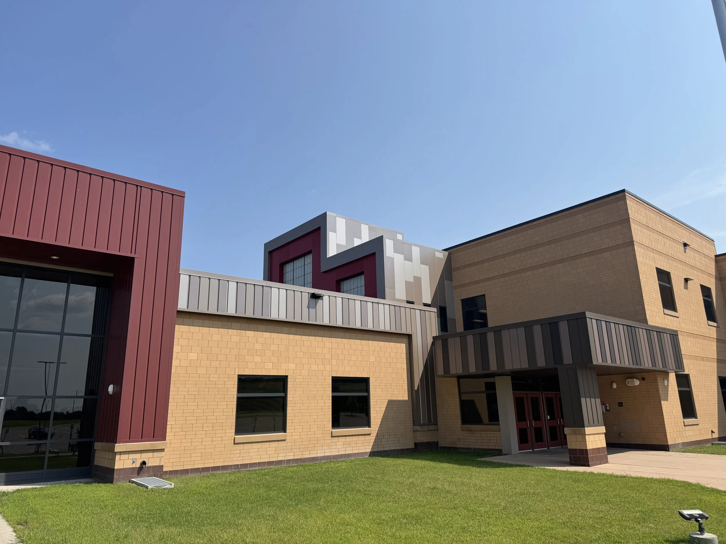 Architectural single skin and aluminum composite panels installed at Lakeland Elementary School in Willmar, MN. 