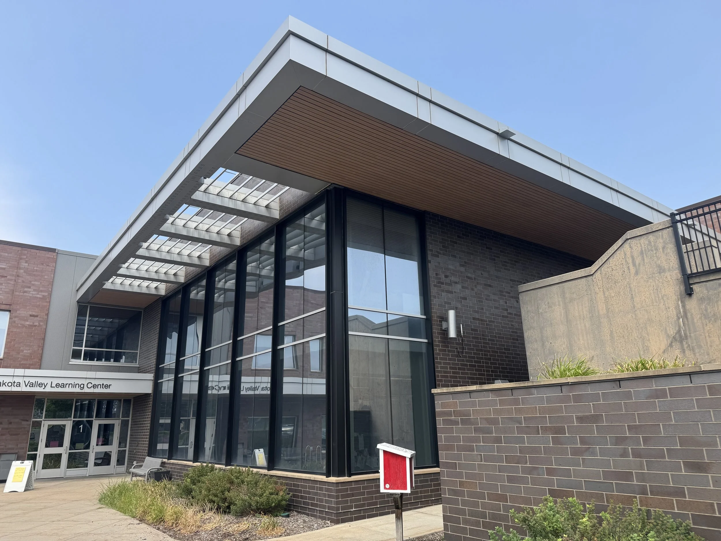 Architectural single skin and aluminum composite panels installed at Dakota Valley Learning Center in Rosemount, MN.