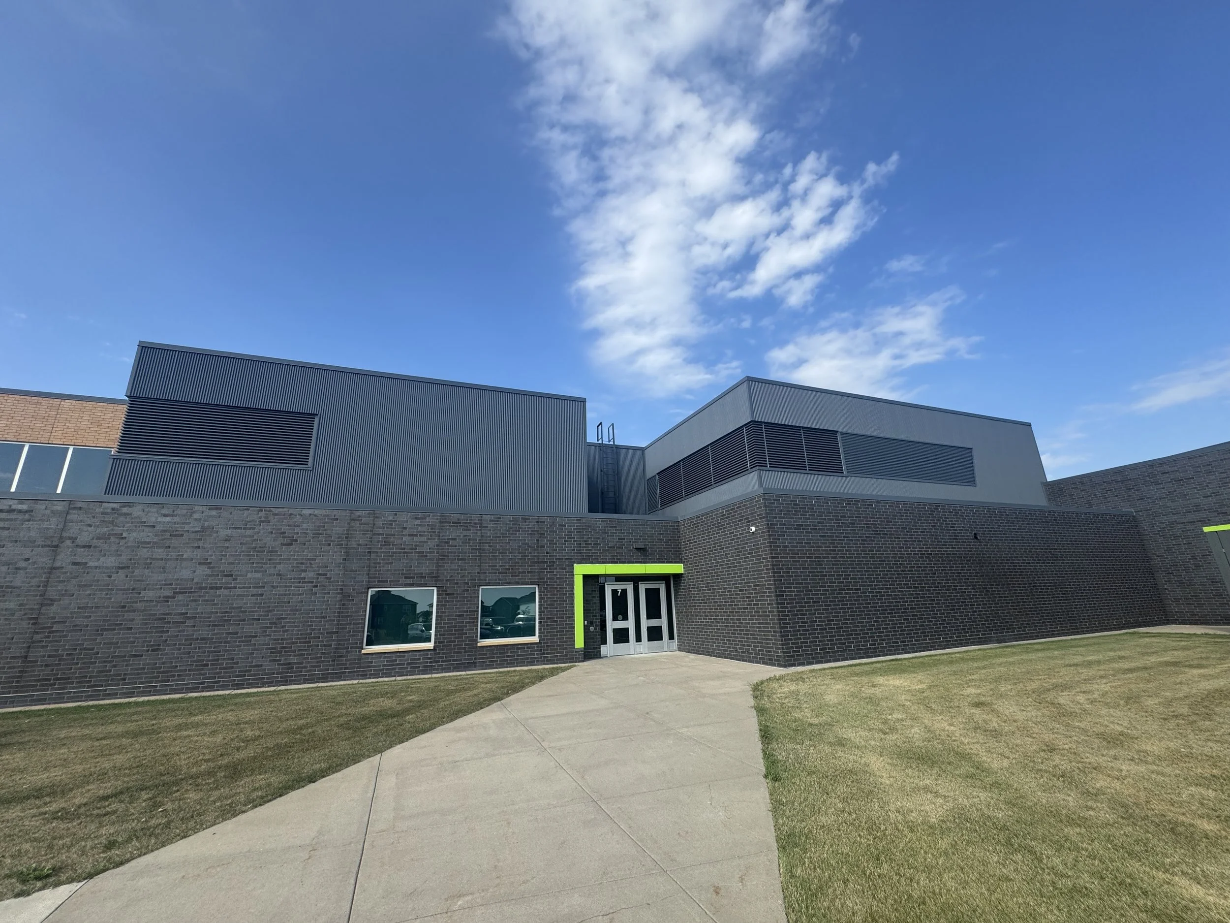 Aluminum composite and architectural single skin panels installed at Prairie View Elementary School in Otsego, MN.