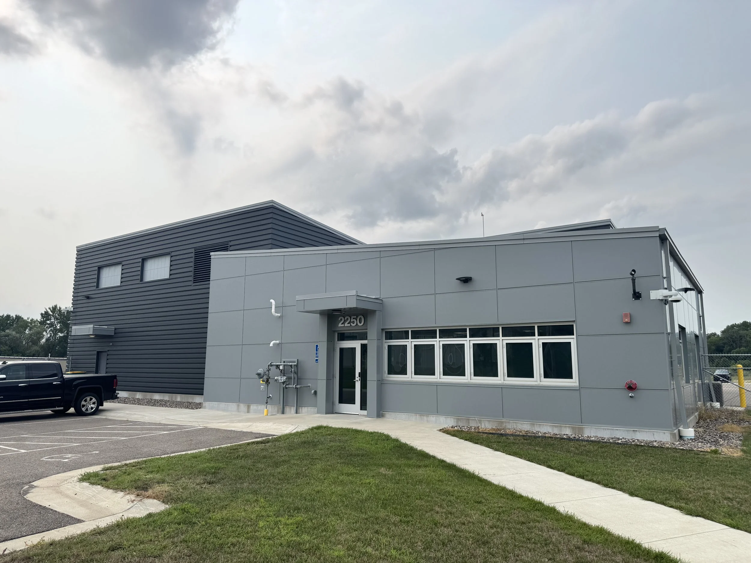 Architectural single skin and aluminum composite panels installed at MnDOT Truck Station in Northfield, MN