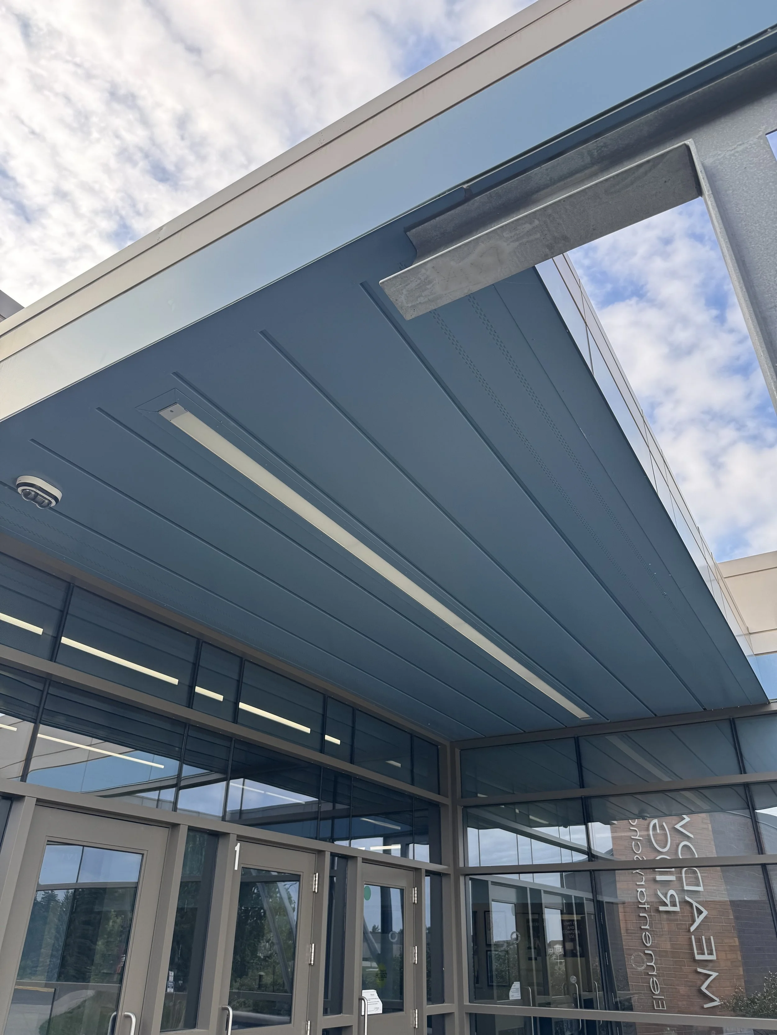 Aluminum composite and architectural single skin panels installed at Meadow Ridge Elementary School in Wayzata, MN.