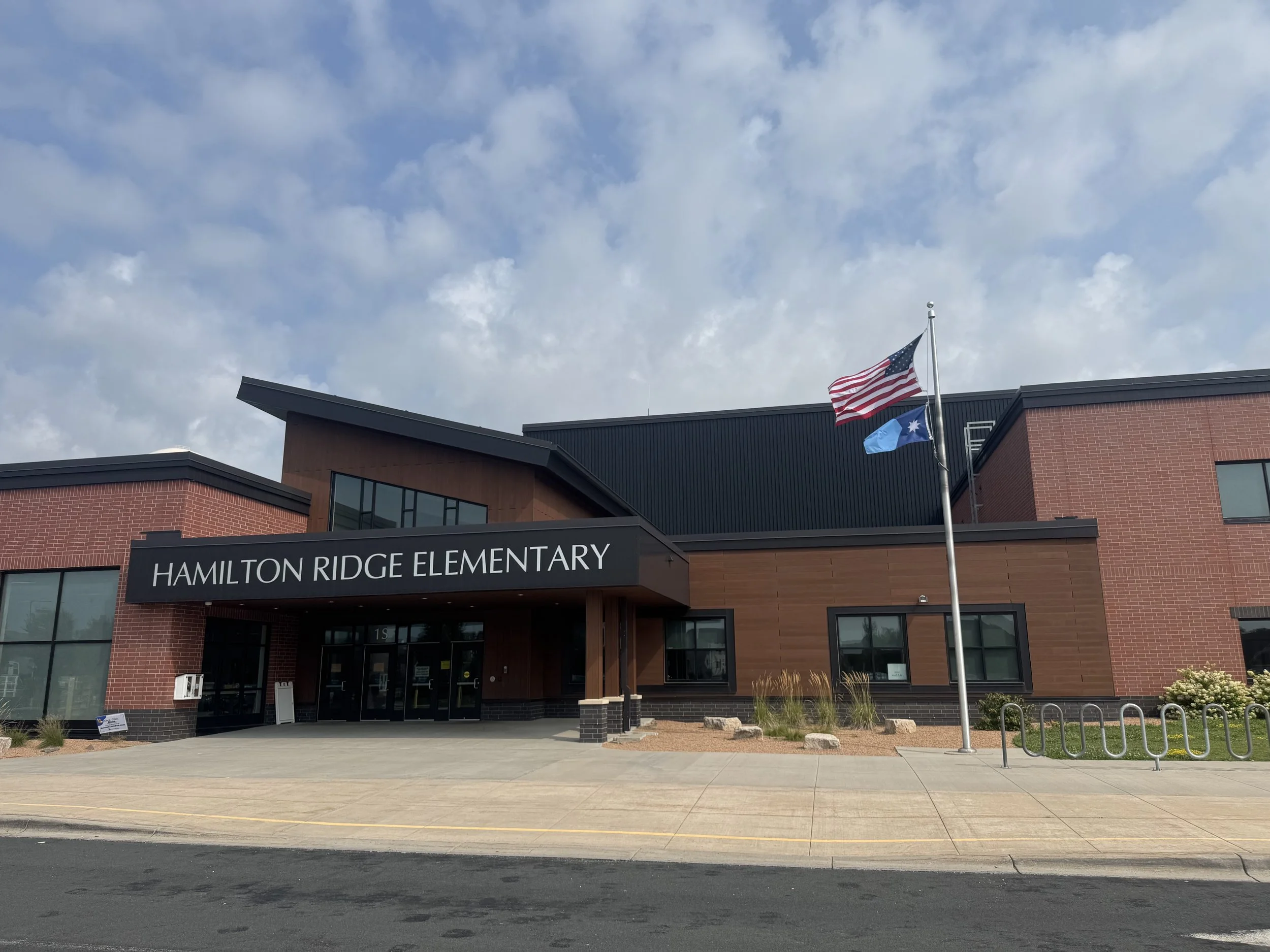 Wood grain phenolic composite and architectural single skin panels installed at Hamilton Ridge Elementary School in Savage, MN.