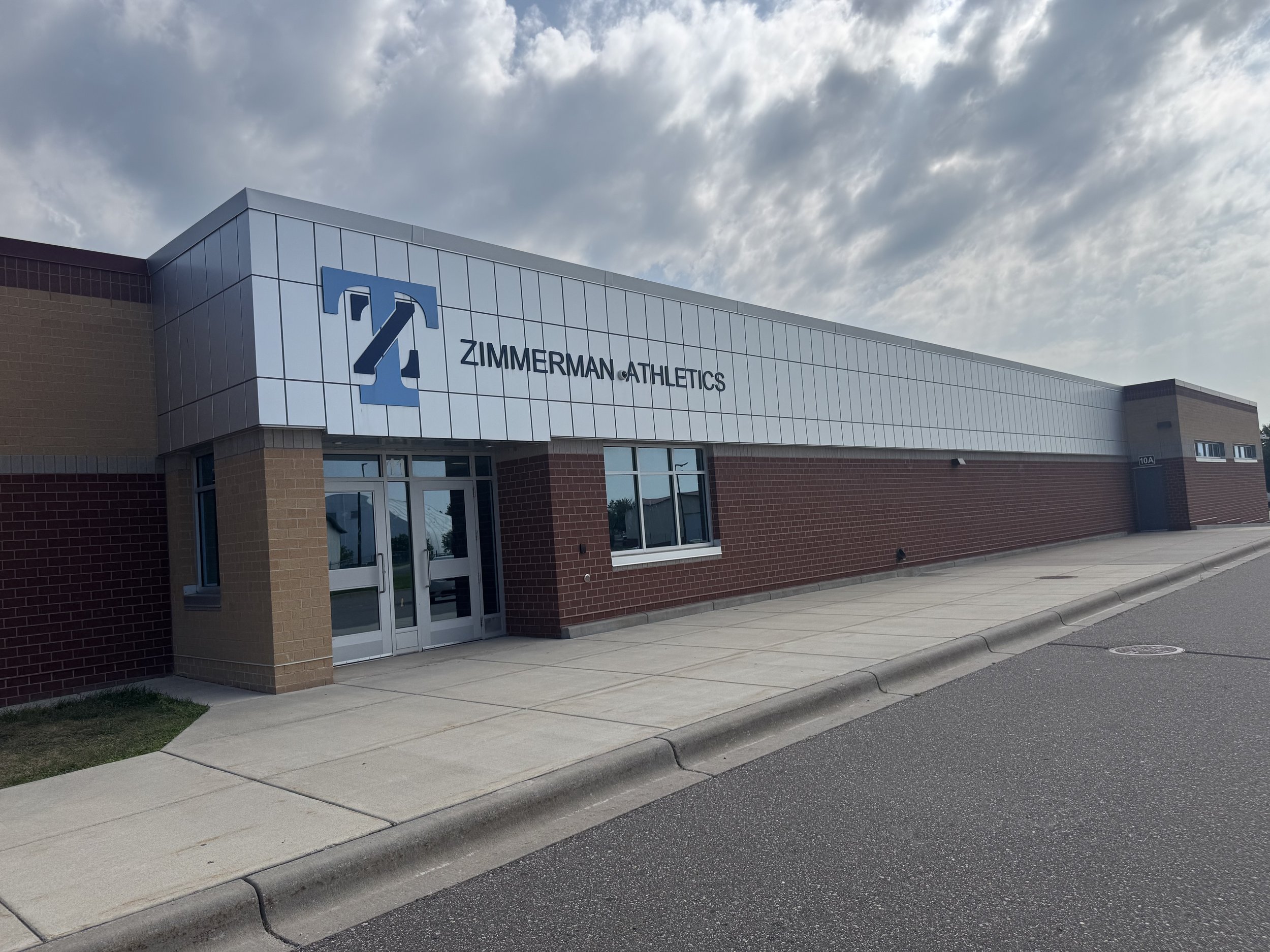Aluminum plate panels installed at the gymnasium addition at Zimmerman Middle & High School in Zimmerman, MN.