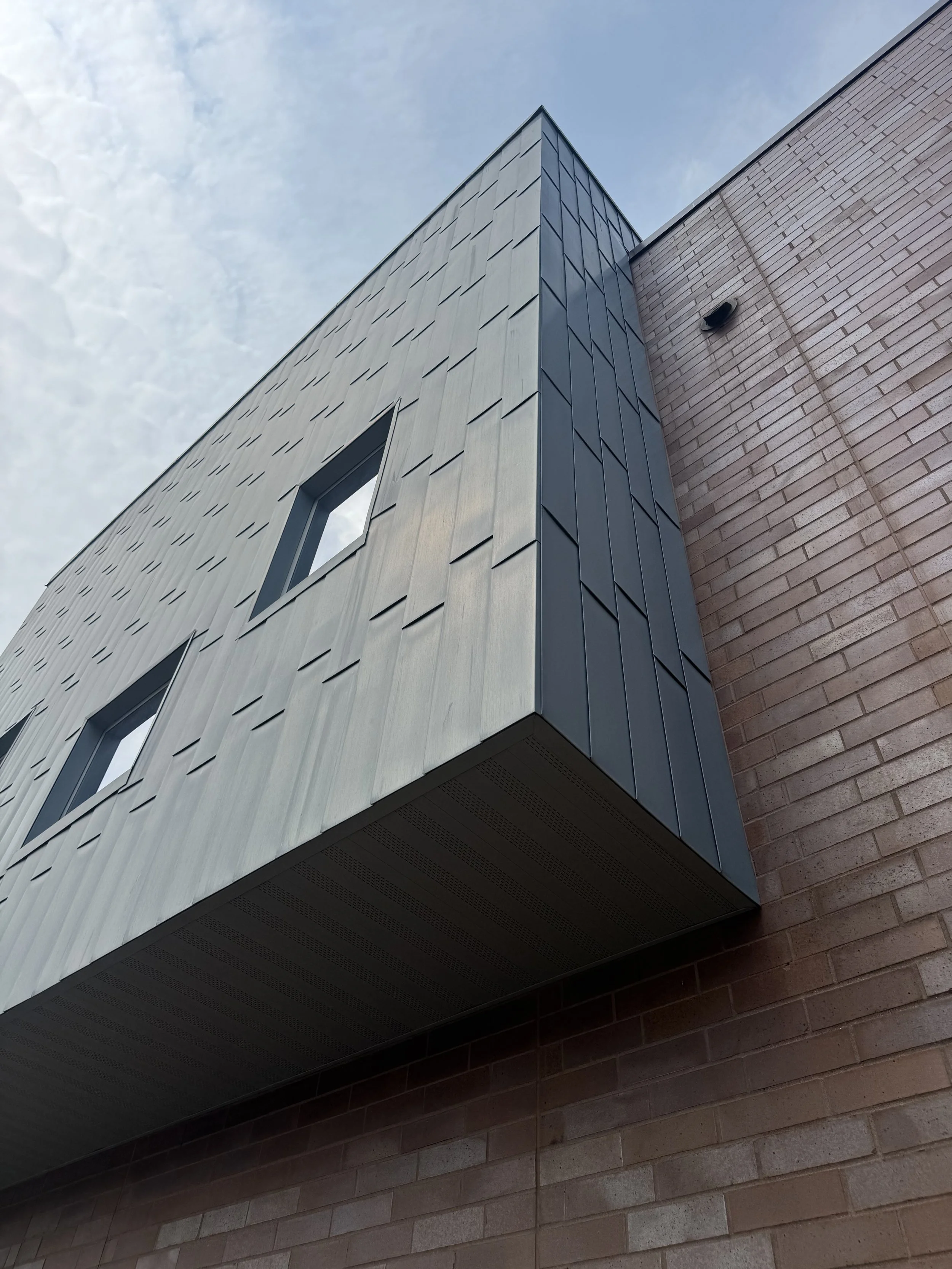 Zinc flat lock panels installed at Dakota Valley Learning Center in Rosemount, MN.