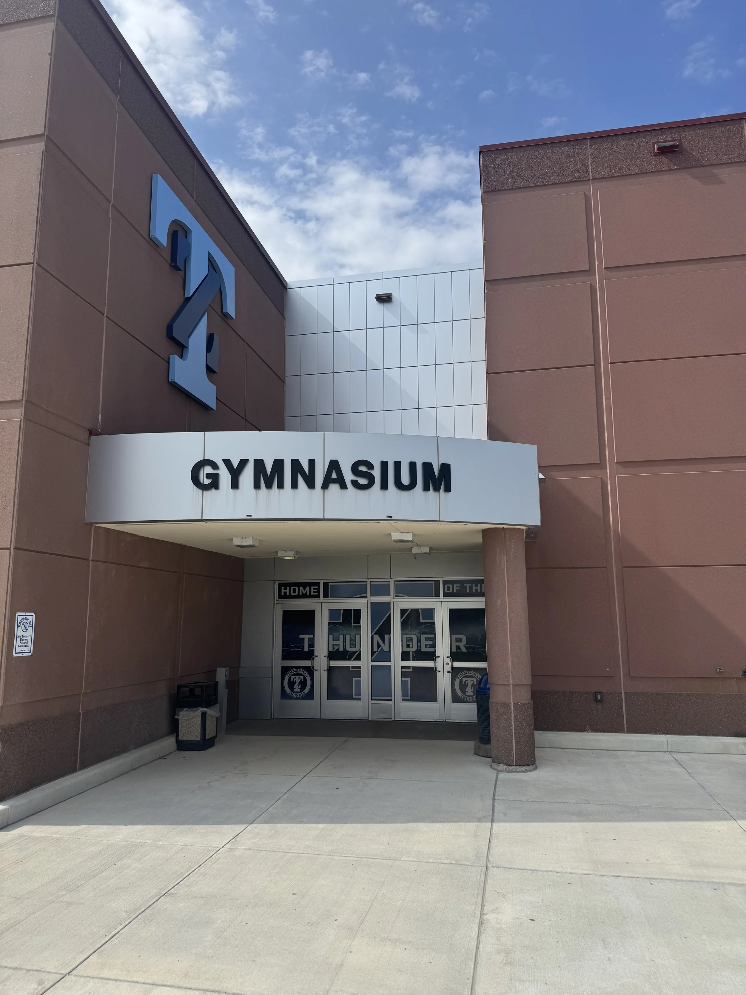 Aluminum plate panels installed at the gymnasium addition at Zimmerman Middle & High School in Zimmerman, MN.