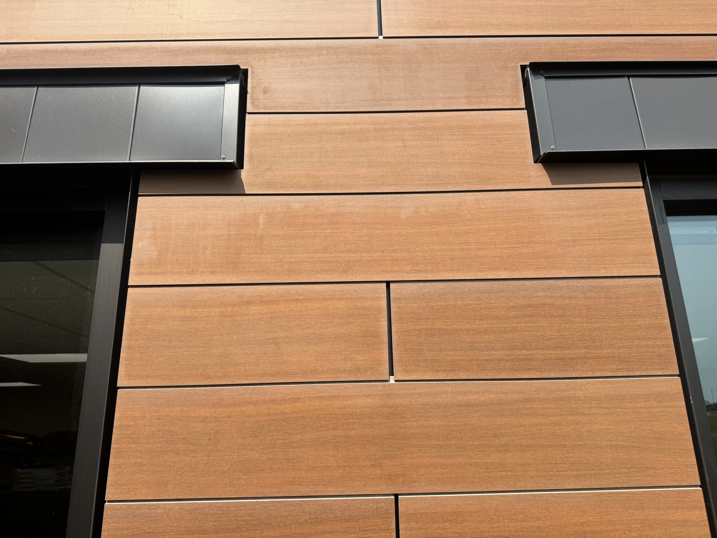 Wood grain phenolic composite and architectural single skin panels installed at Hamilton Ridge Elementary School in Savage, MN.