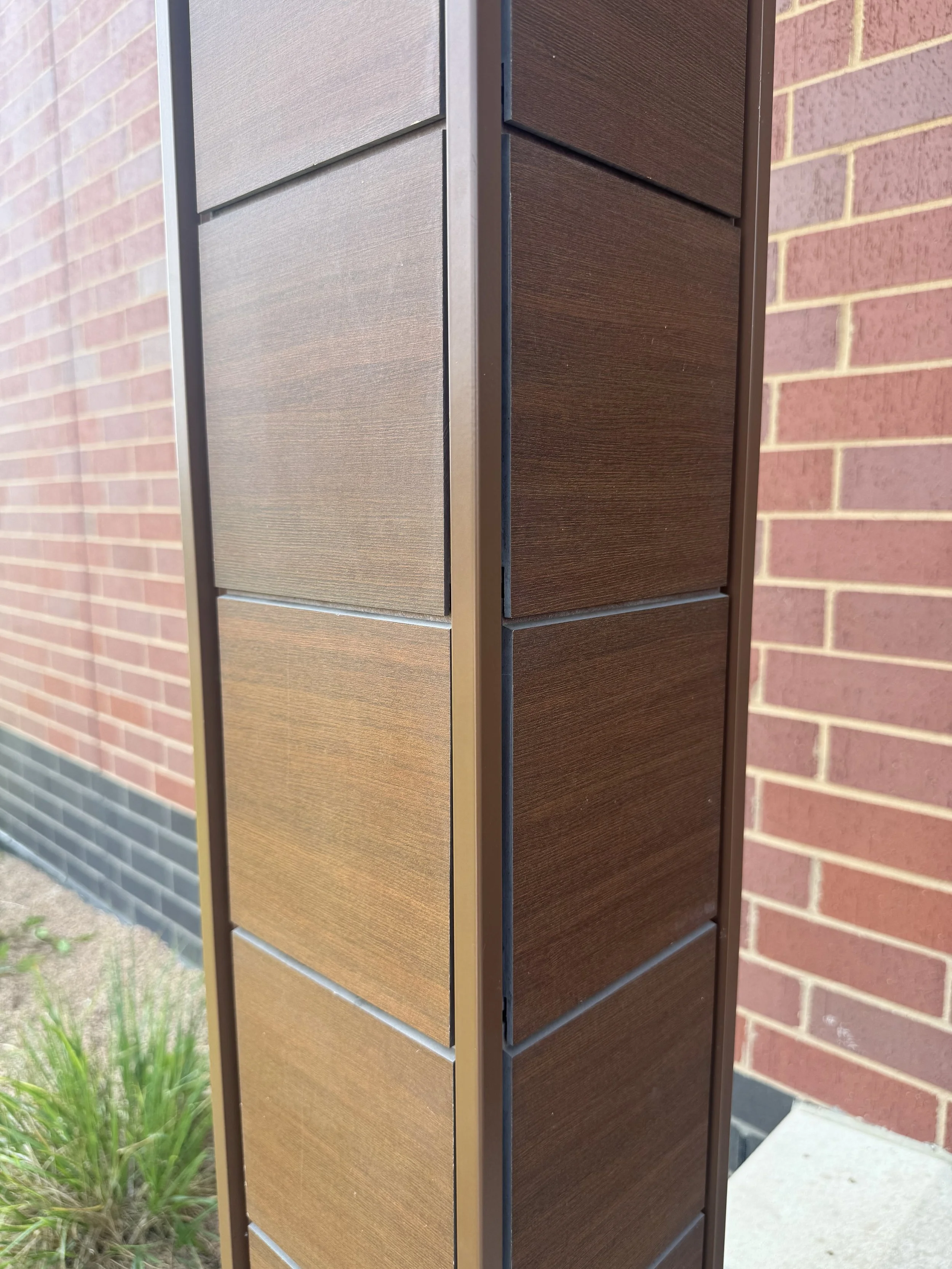 Wood grain phenolic composite and architectural single skin panels installed at Hamilton Ridge Elementary School in Savage, MN.