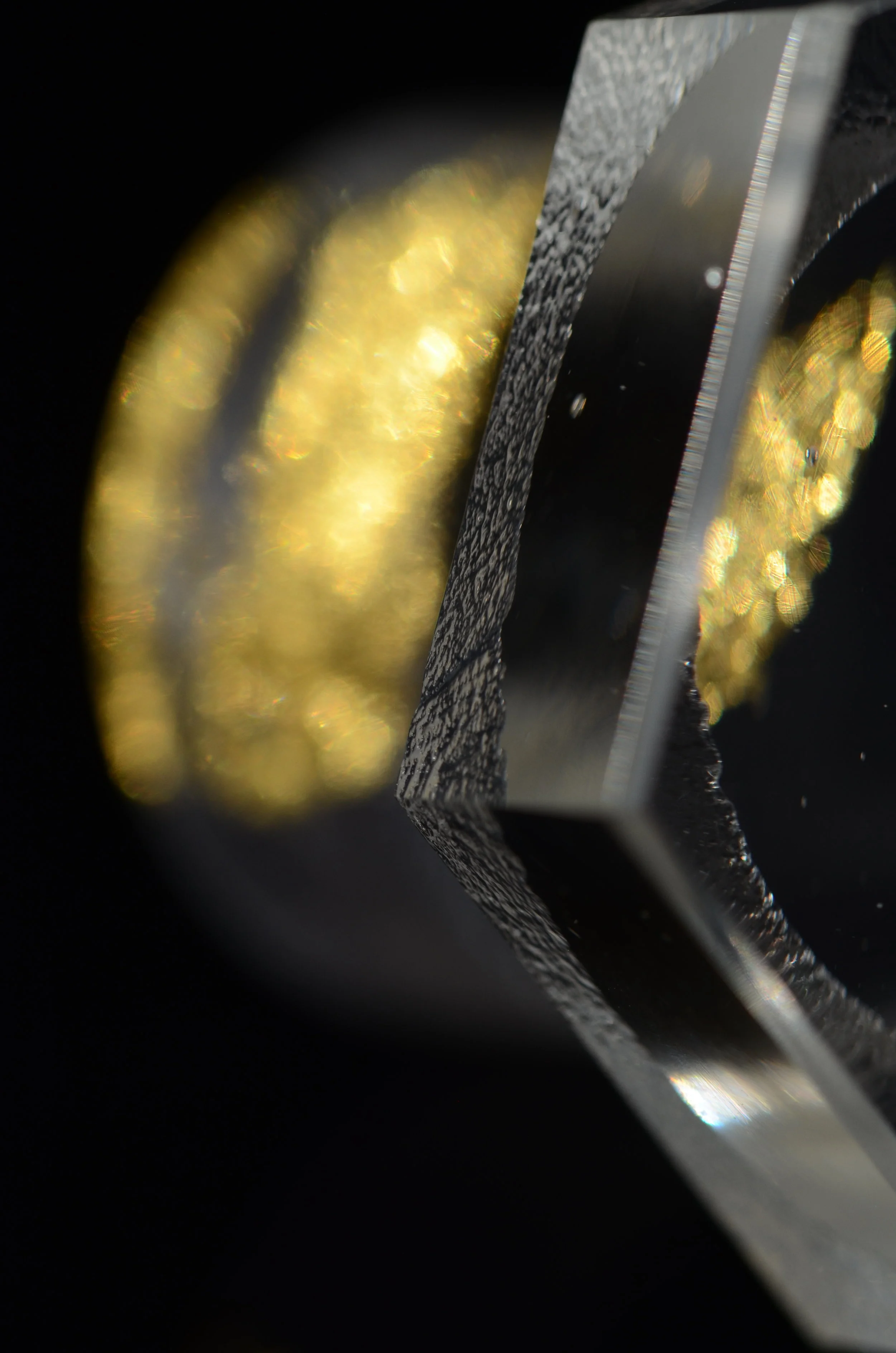 Closeup of faceted Waken Glass knob, polished and unpolished