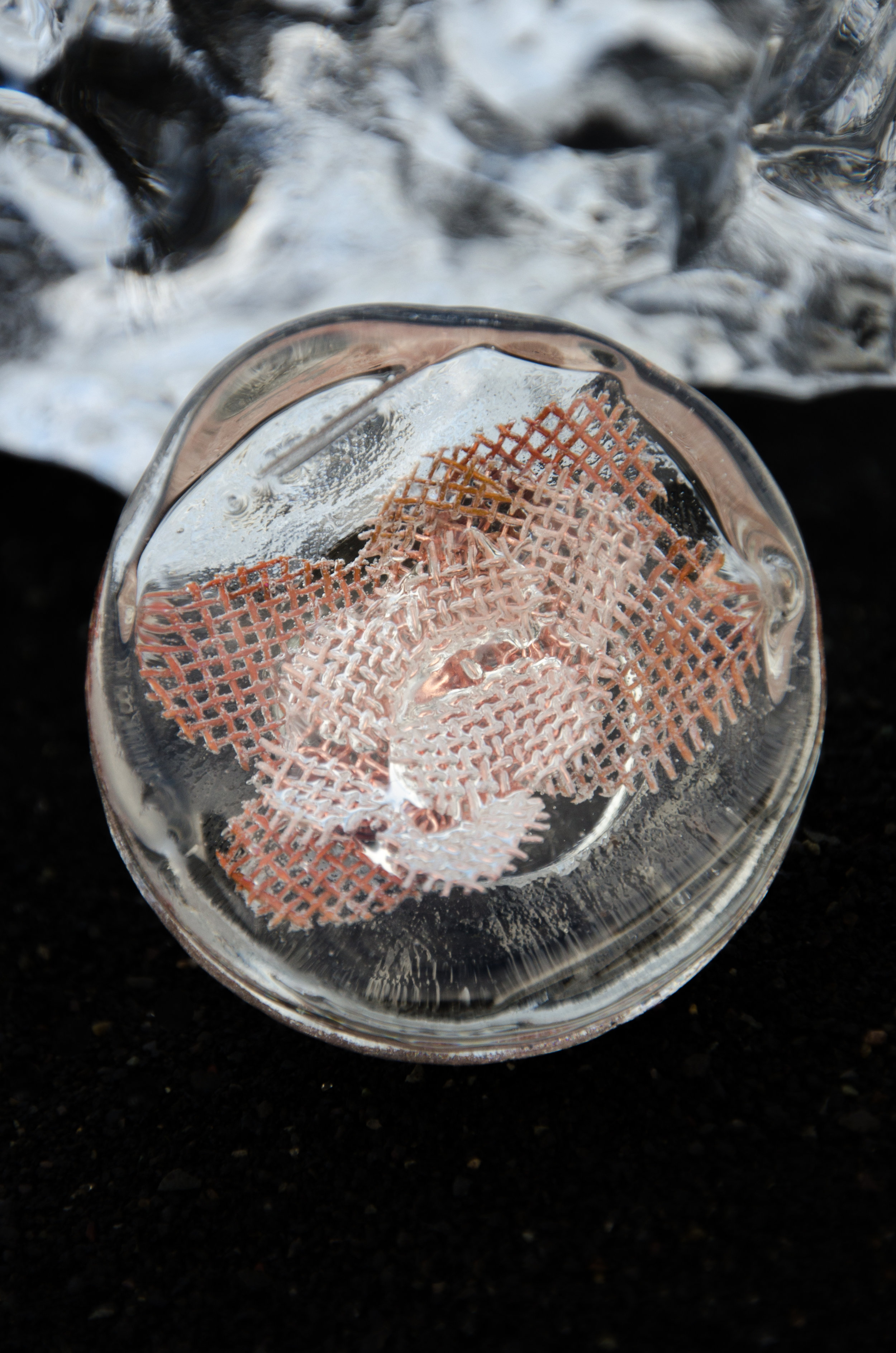 Closeup of copper flower inside Waken Glass cap