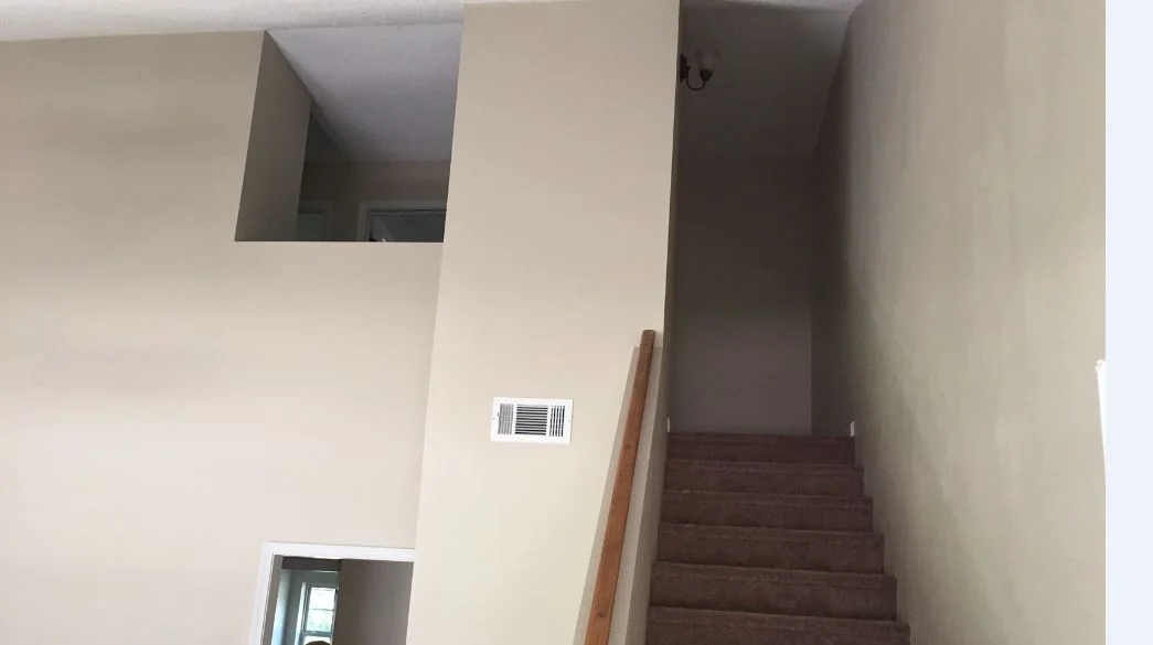 Living Room stairs to Upper Level