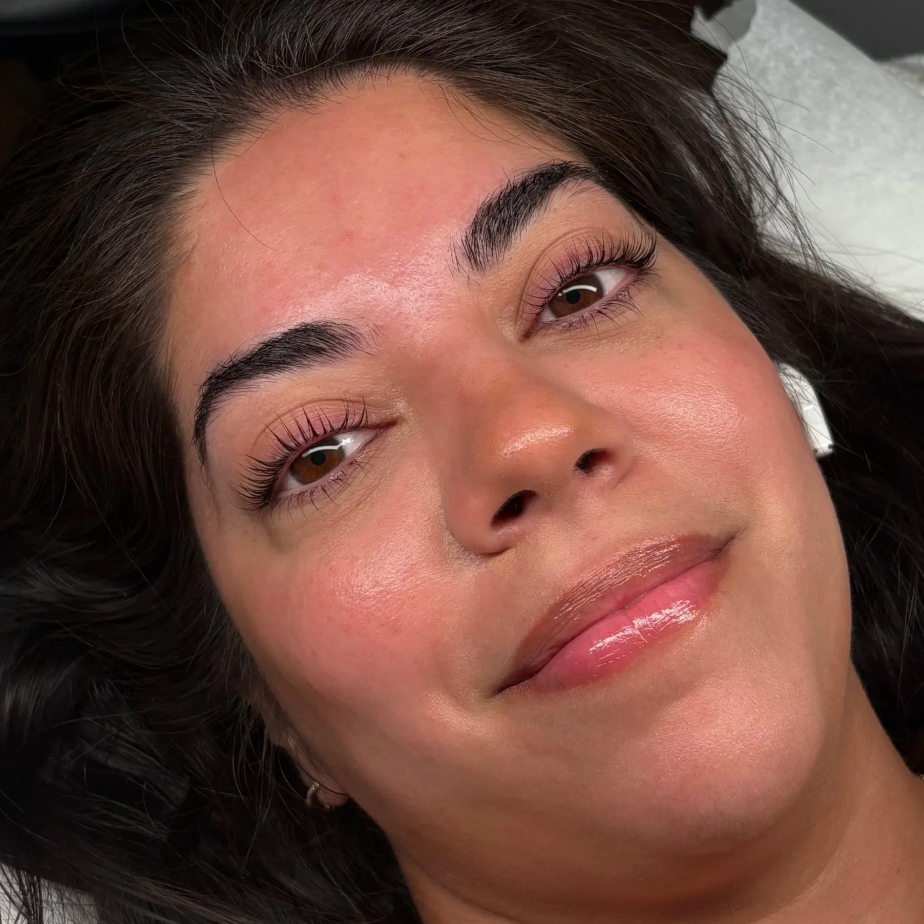Close-up of a woman with a lash lift or perm from DC Lash Bar.