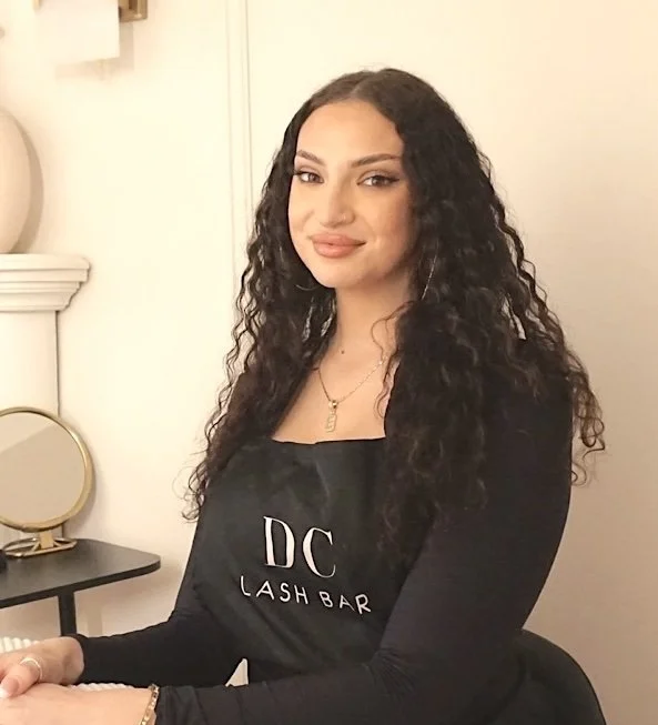 A senior technician specializing in eyelash extensions at DC Lash Bar.