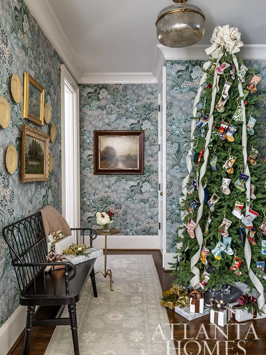 Wallpaper Wednesday in full holiday spirit ✨
This back hall is wrapped in a stunning Thibaut print and dressed for the season with our client&rsquo;s cherished Bauble Stocking collection &mdash; each one a tiny treasure.
So grateful to see this festi