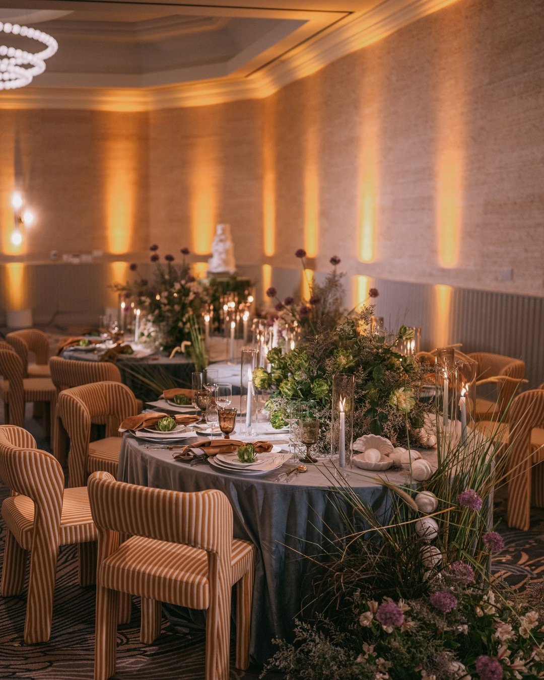 From the intimate moments on the Seascape Terrace to the elegantly styled Jacaranda Ballroom, the reception unfolded with seamless grace across two distinct spaces. Each venue brought its own character while maintaining a cohesive aesthetic&mdash;war
