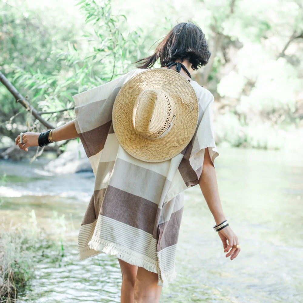 Salty + Pine kaftan tunic in brown and tan stripes with natural fringe.