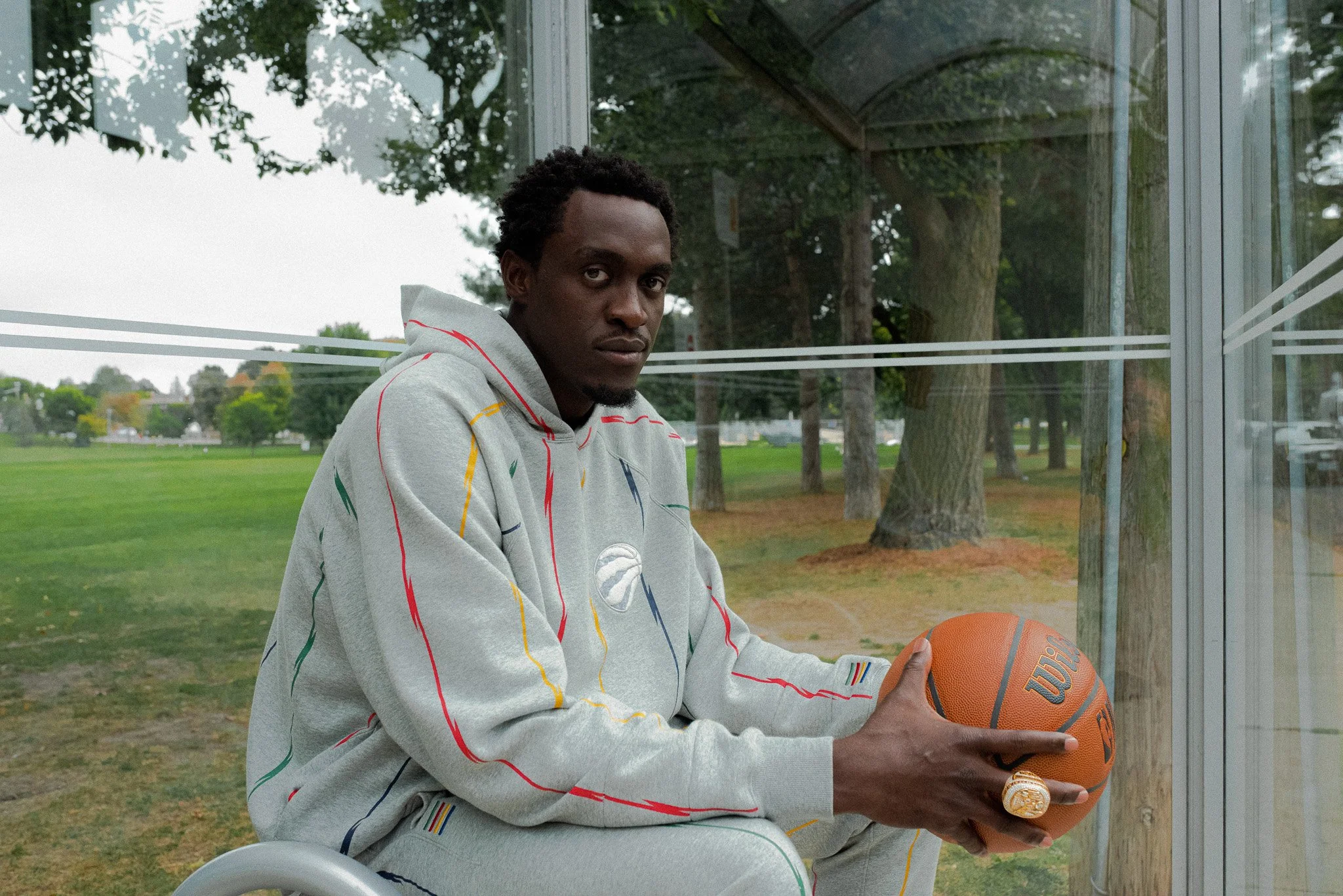 2022OCT_Raptors_Campaign_Pascal_GreyStripedHoodie_01.jpg