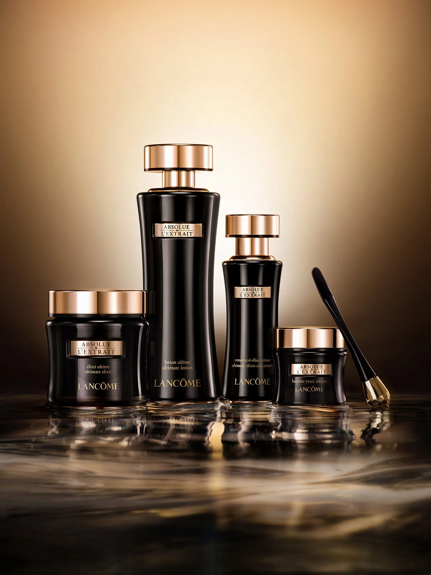 Lancôme Absolue L'Extrait skincare range in black and gold, standing on rippling liquid in warm backlight, key visual by Hiro
