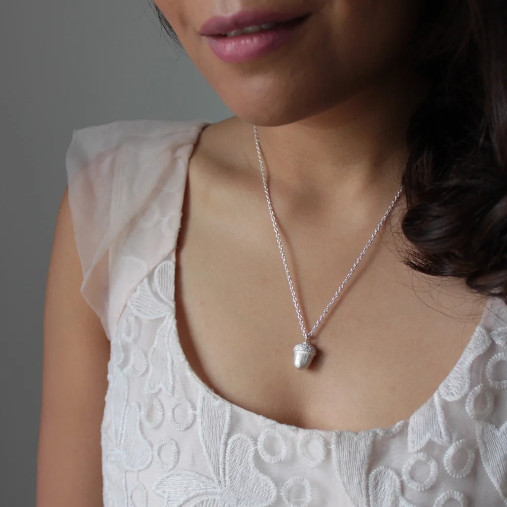 silver_tiny_acron_charm_necklace_1.jpg