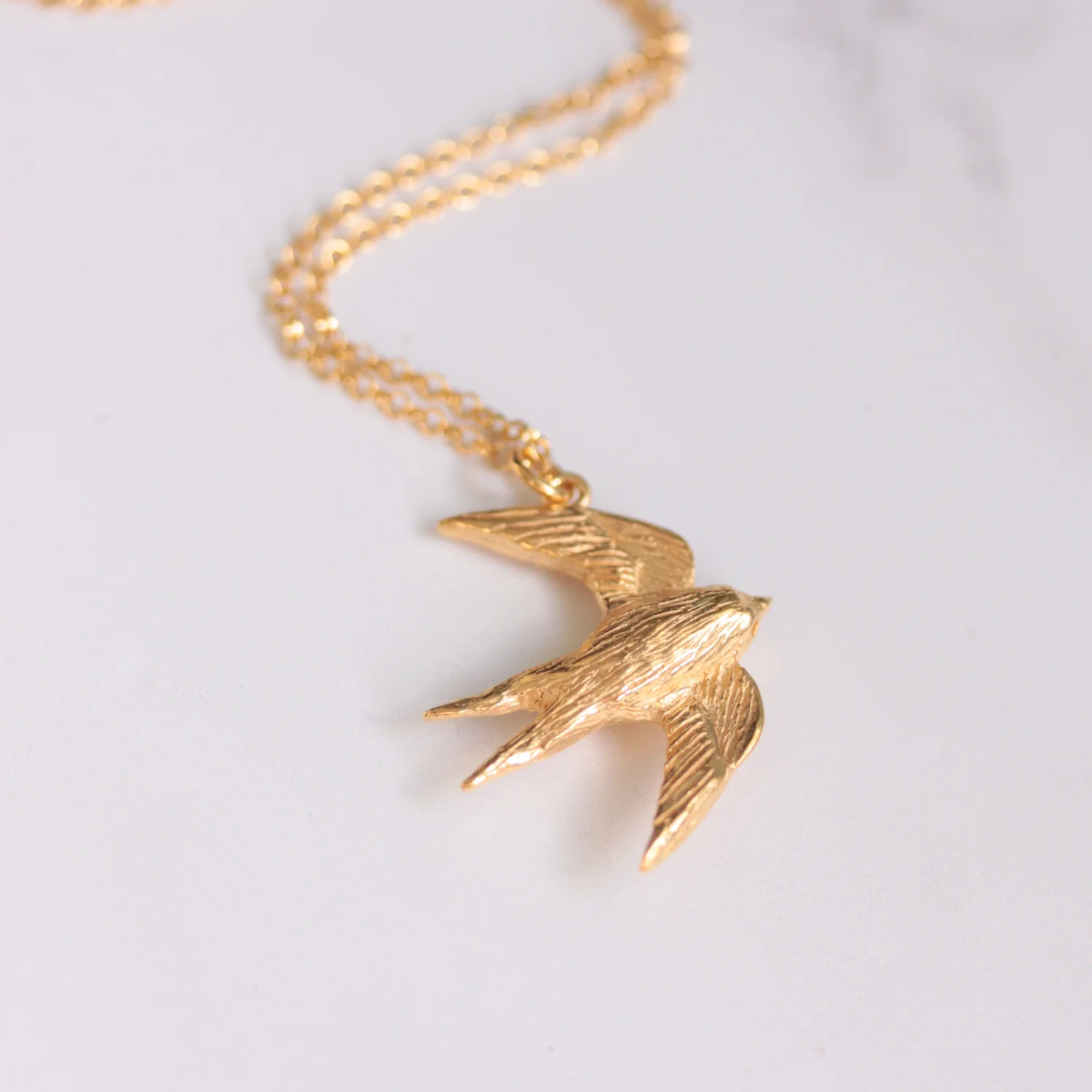 gold_swallow_necklace_2.jpg