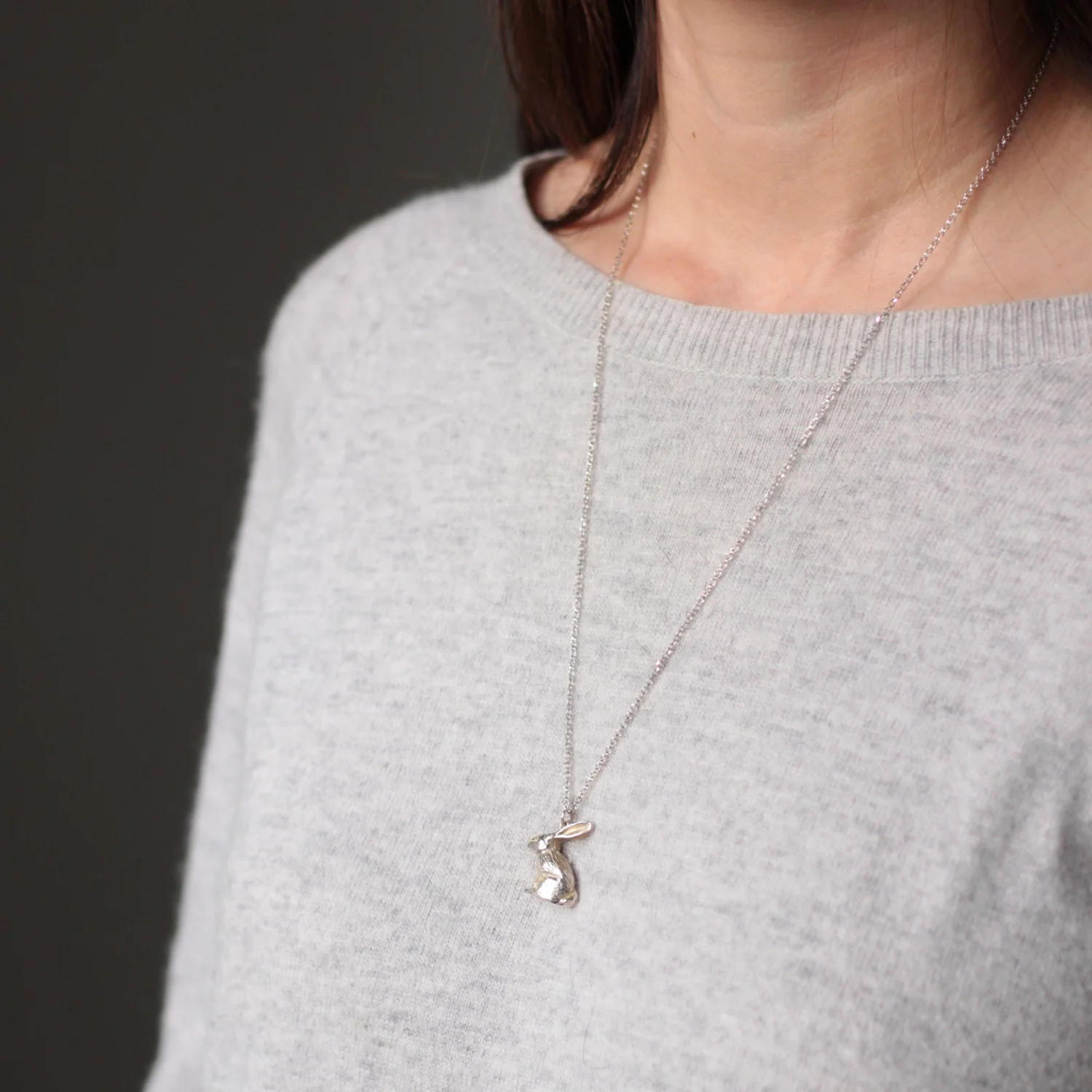 silver_rabbit_necklace_on_model.jpg