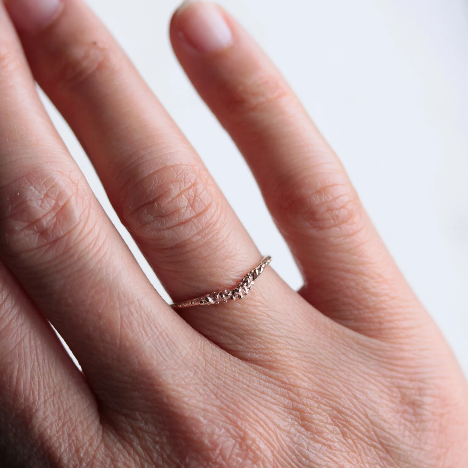 gold_forest_wishbone_ring_on_hand.jpg