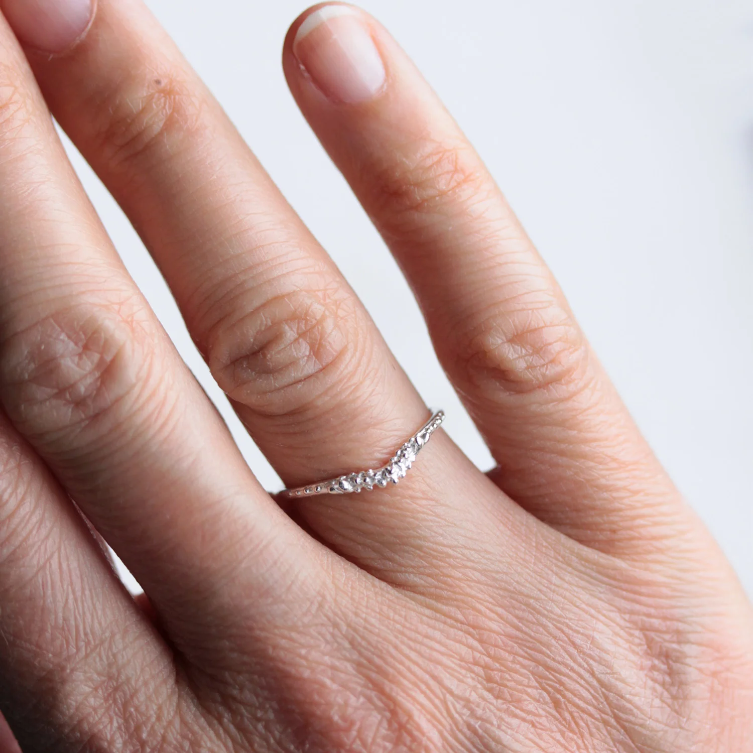 silver_forest_wishbone_ring_on_hand.jpg